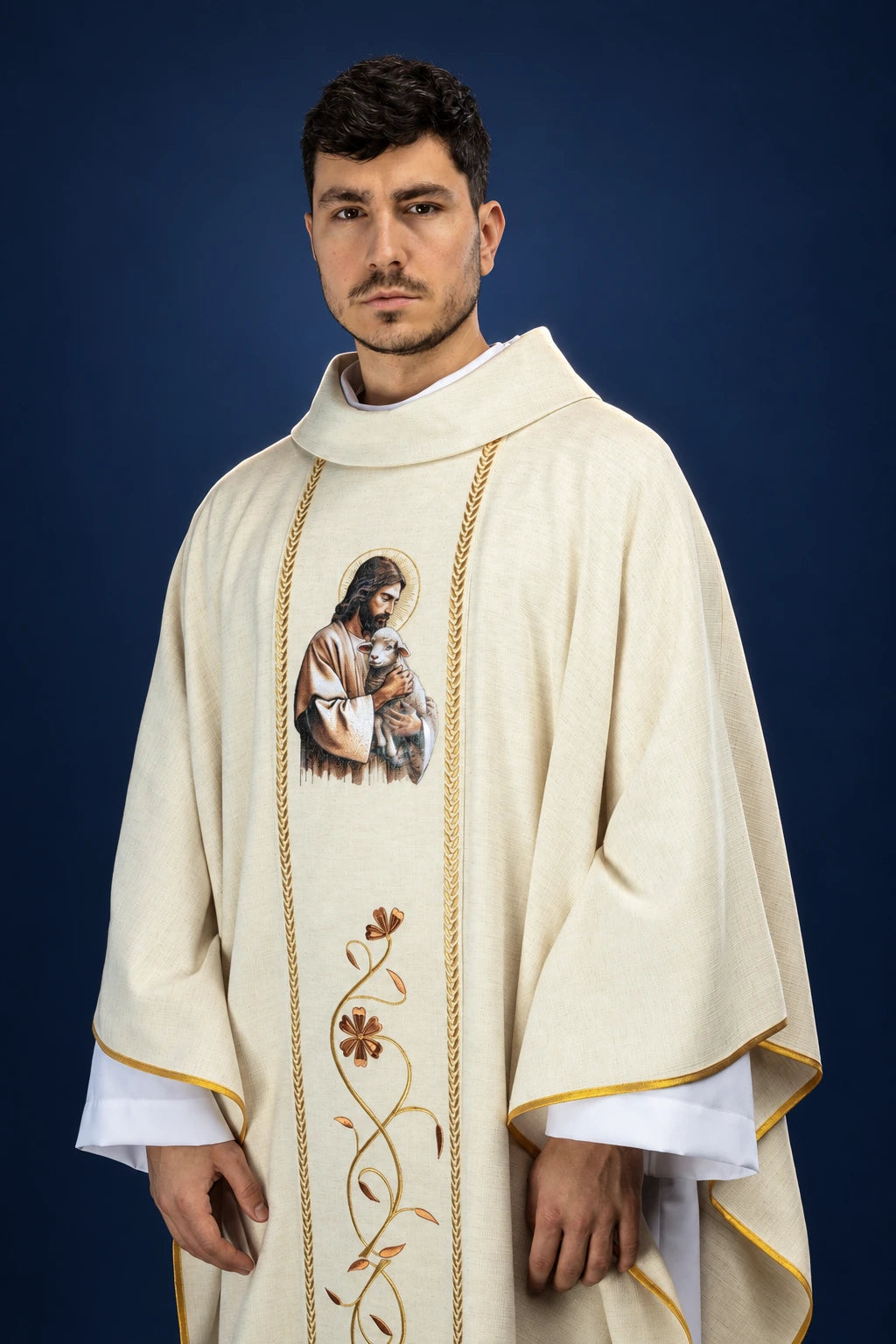 Front view of ecru chasuble with Good Shepherd embroidery and gold floral orphrey