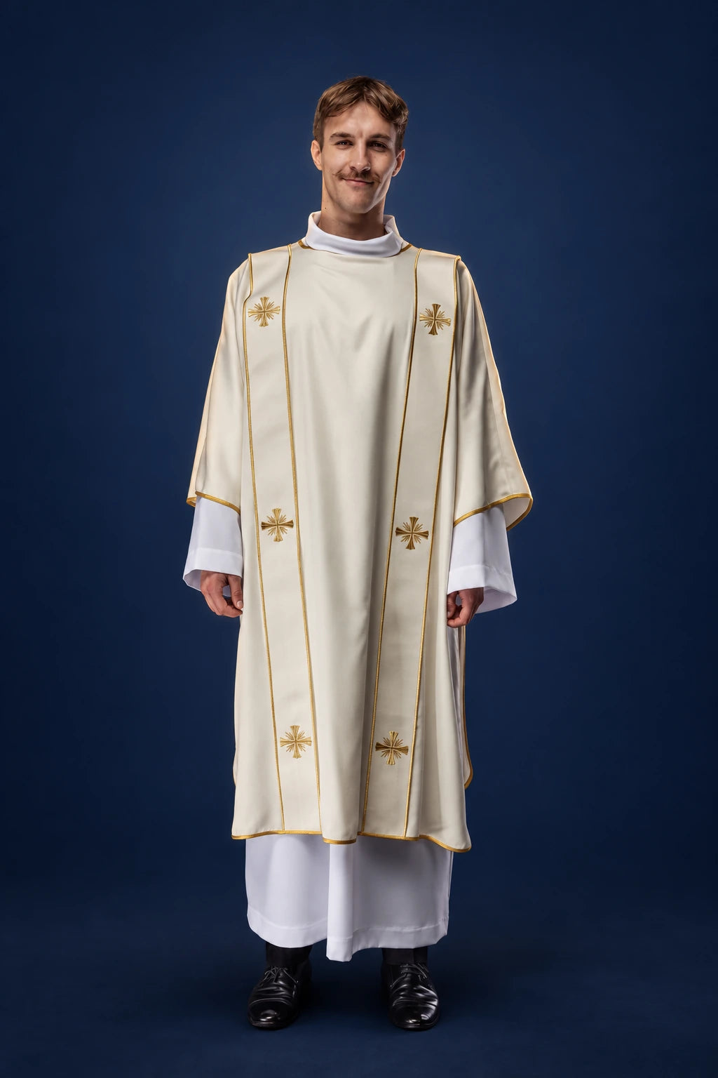 Front view of an ecru dalmatic with gold orphreys and embroidered crosses