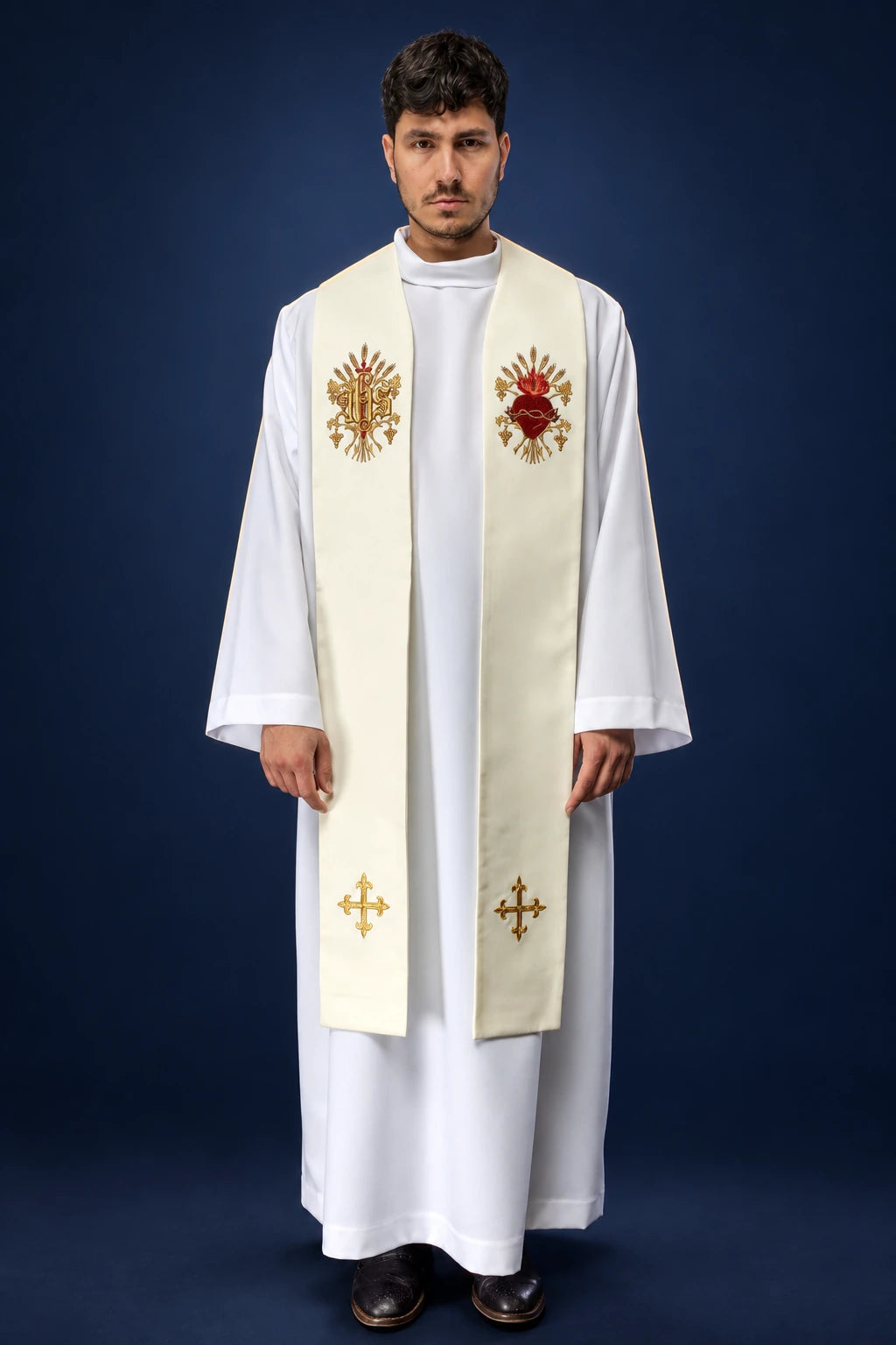 Front view of an ecru stole with embroidered cross, IHS and Sacred Heart motifs