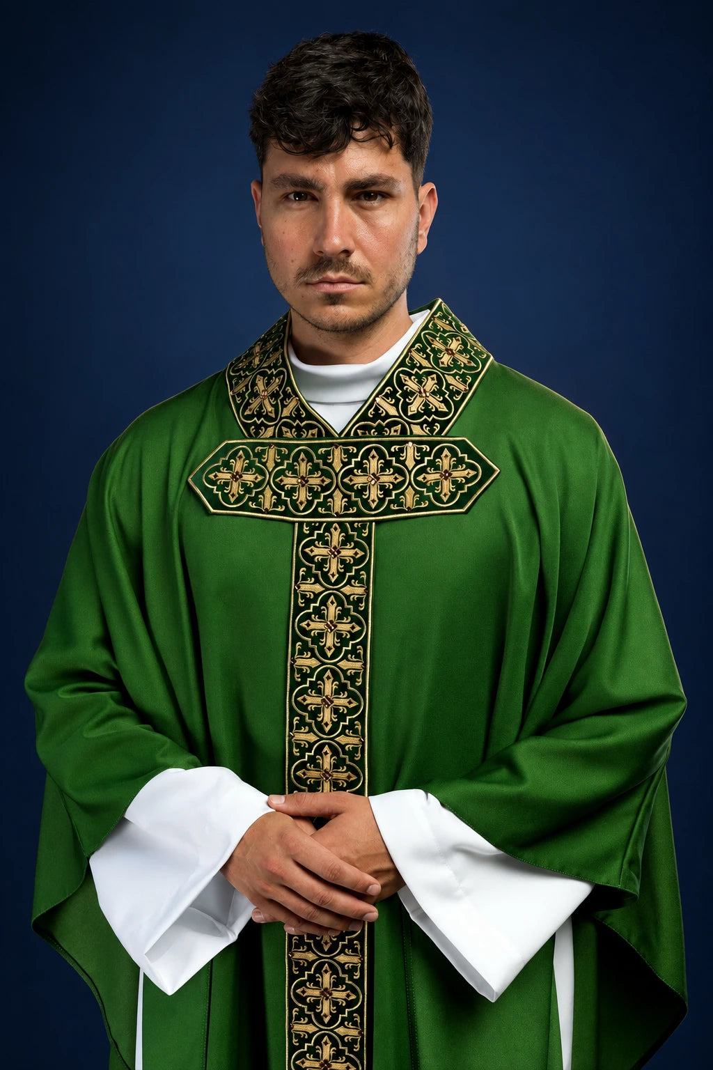 Front view of green chasuble with gold embroidered hanging orphrey and cross motif on the chest and stole panel