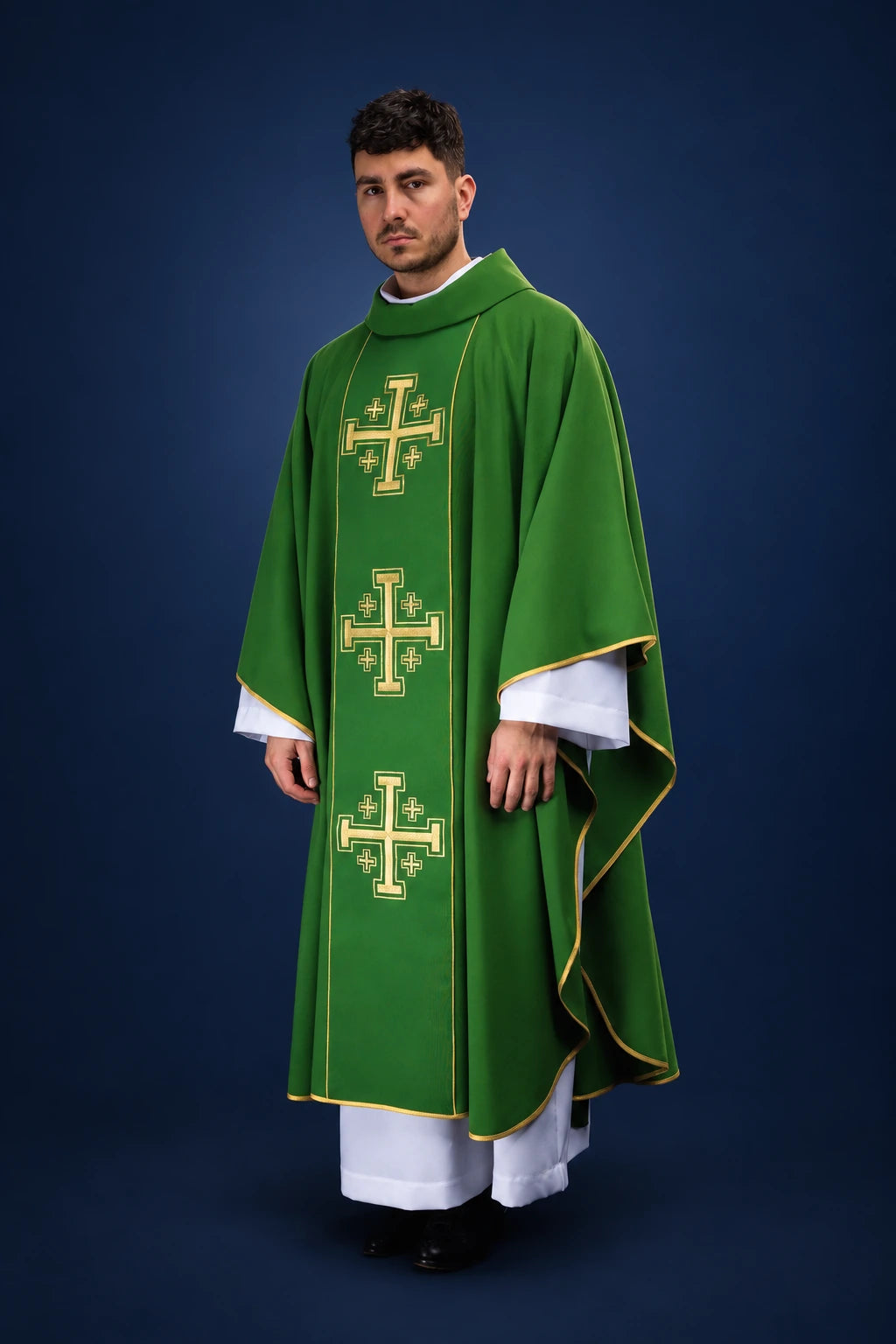 Front view of a green chasuble with gold trim and three Jerusalem crosses on the orphrey