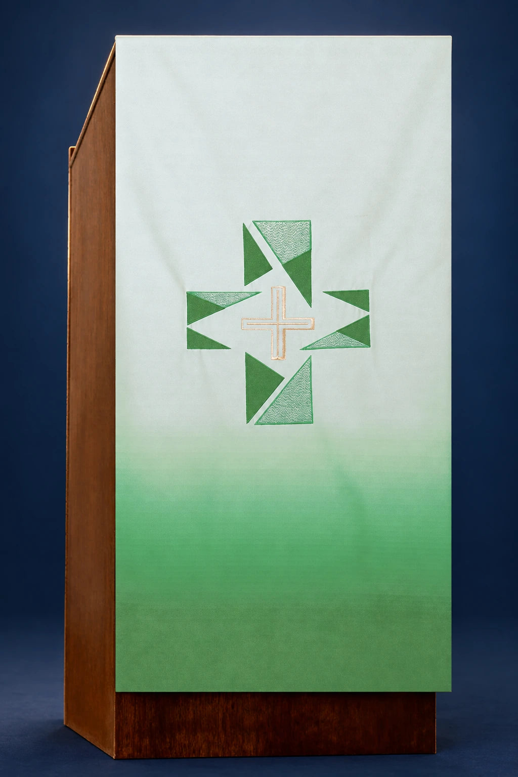 Front view of a green lectern cover with a centered cross motif and gradient shading