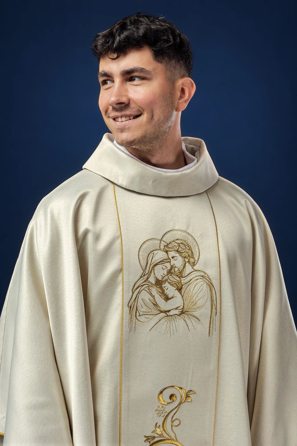 Front view of an ivory chasuble with embroidered Holy Family and gold vine detail