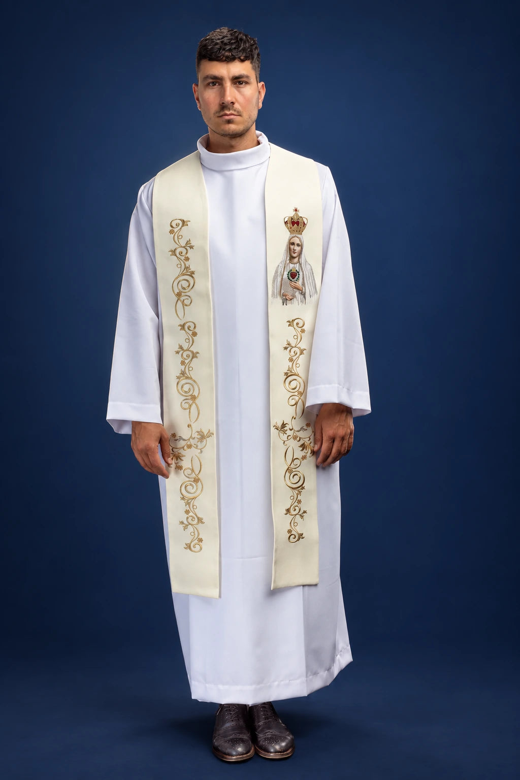 Front view of an ivory stole with gold vine embroidery and Our Lady of Fatima image