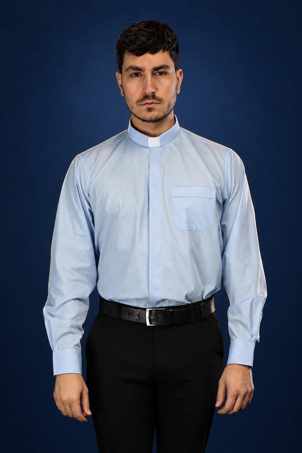 Front view of a light blue long-sleeve clergy shirt with clerical collar and chest pocket