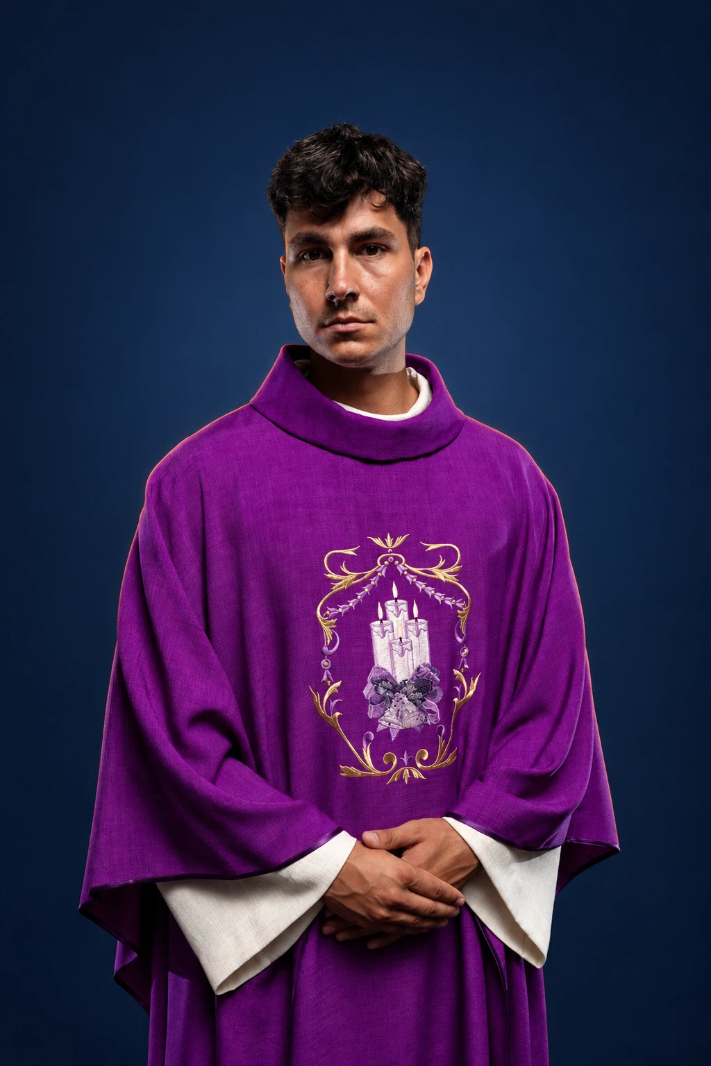 Front view of a purple Advent chasuble with embroidered candle motif and gold scrollwork