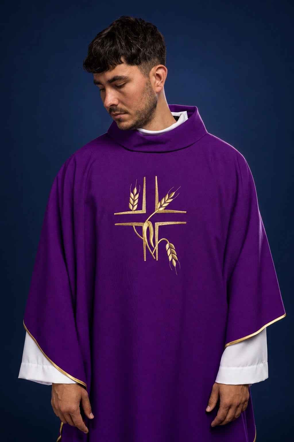 Front view of a purple chasuble with gold cross and wheat embroidery and gold trim