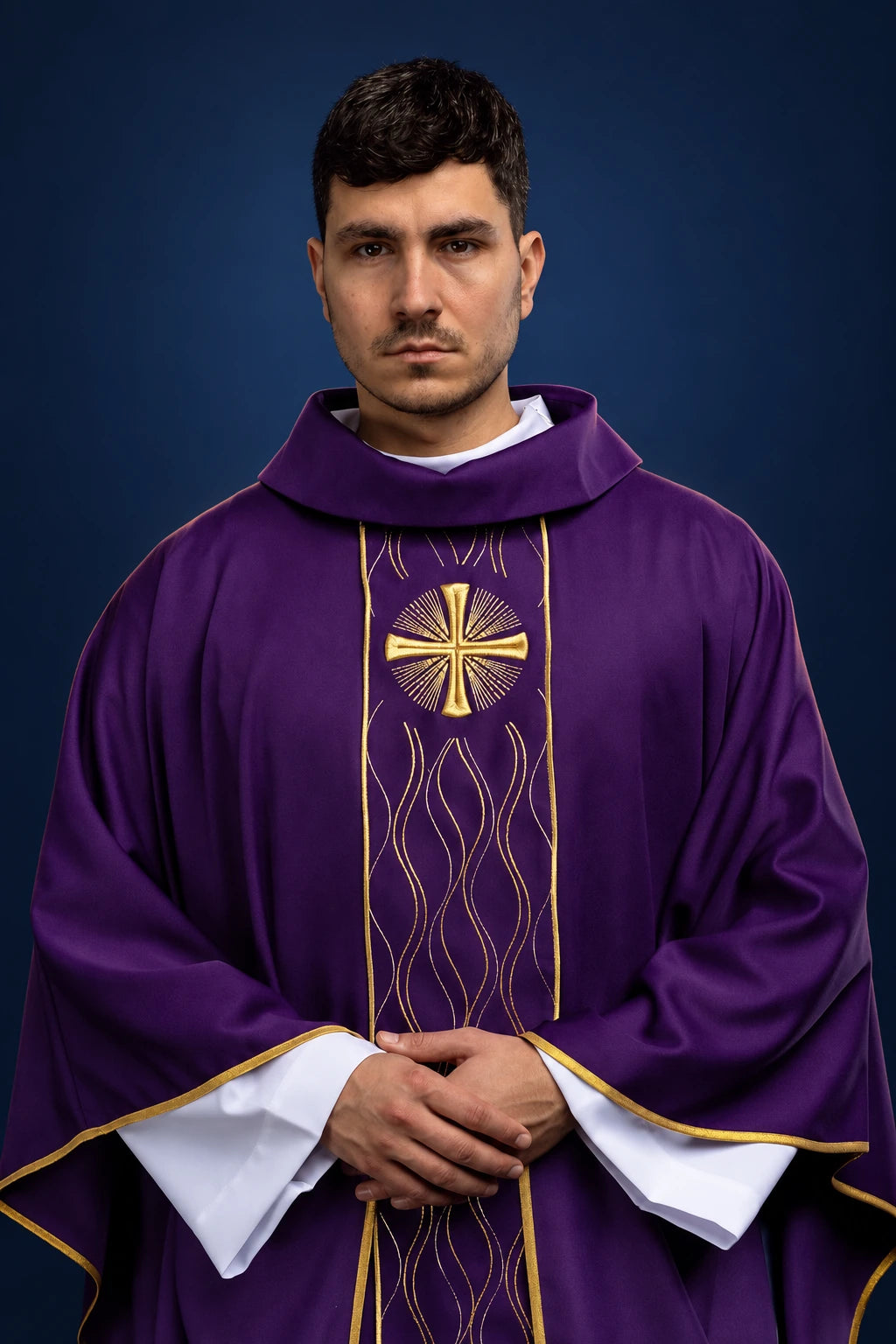 Front view of a purple chasuble with gold embroidered cross and wavy vertical border design