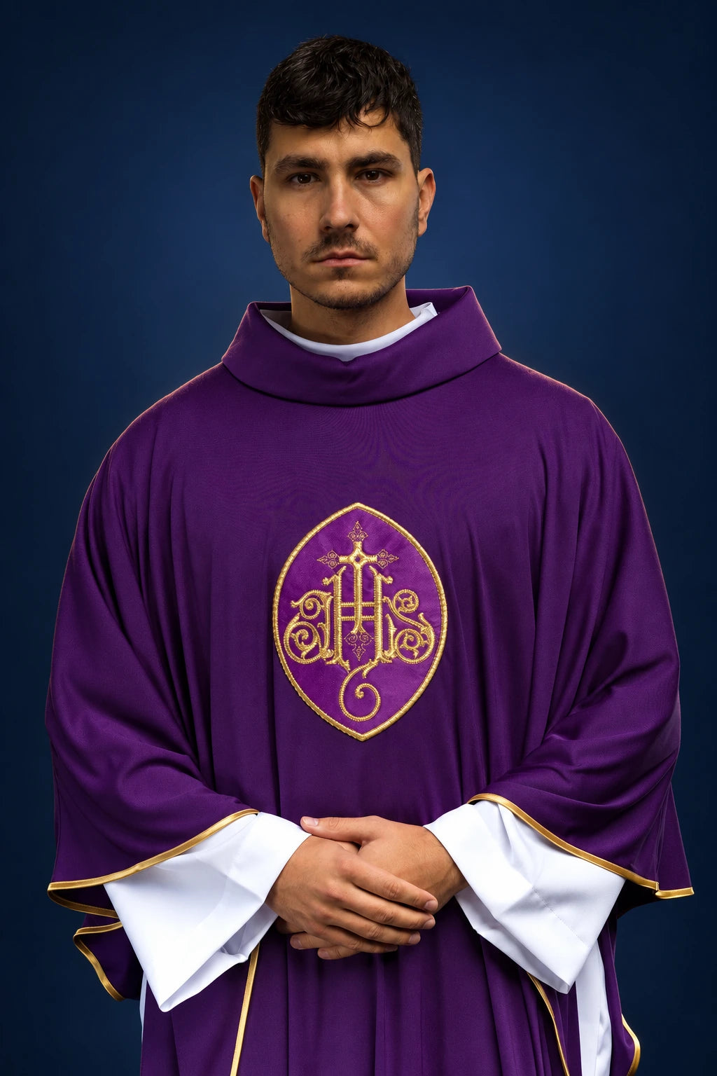 Front view of a purple chasuble with gold IHS embroidery and gold trim over white sleeves