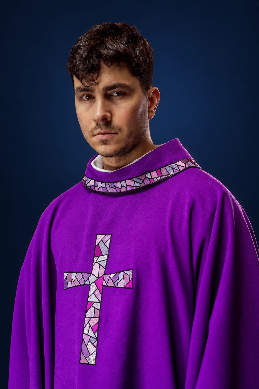 Front view of a purple chasuble with a mosaic cross and matching mosaic collar trim