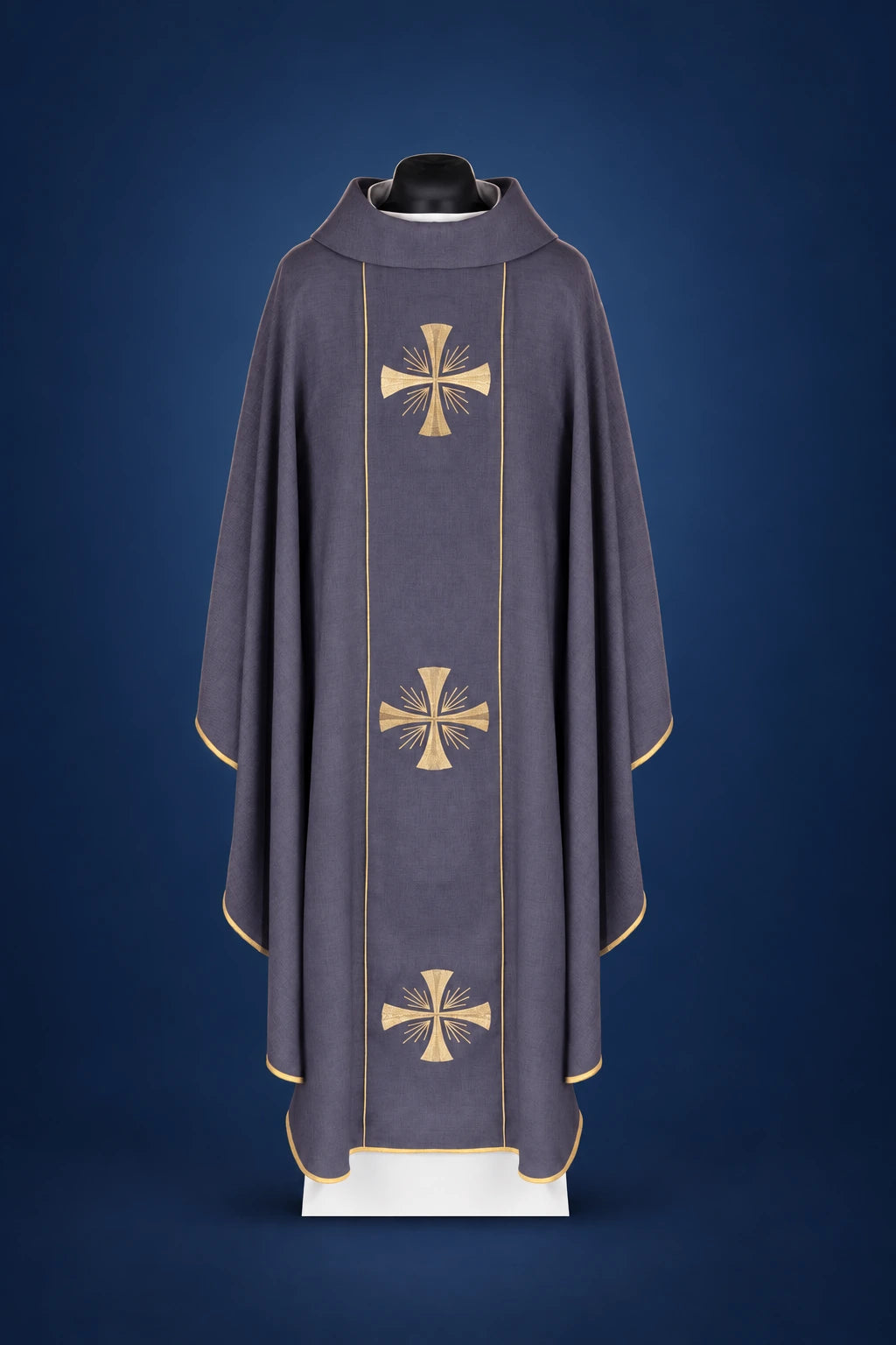 Front view of a purple chasuble with vertical orphrey and three gold cross embroideries