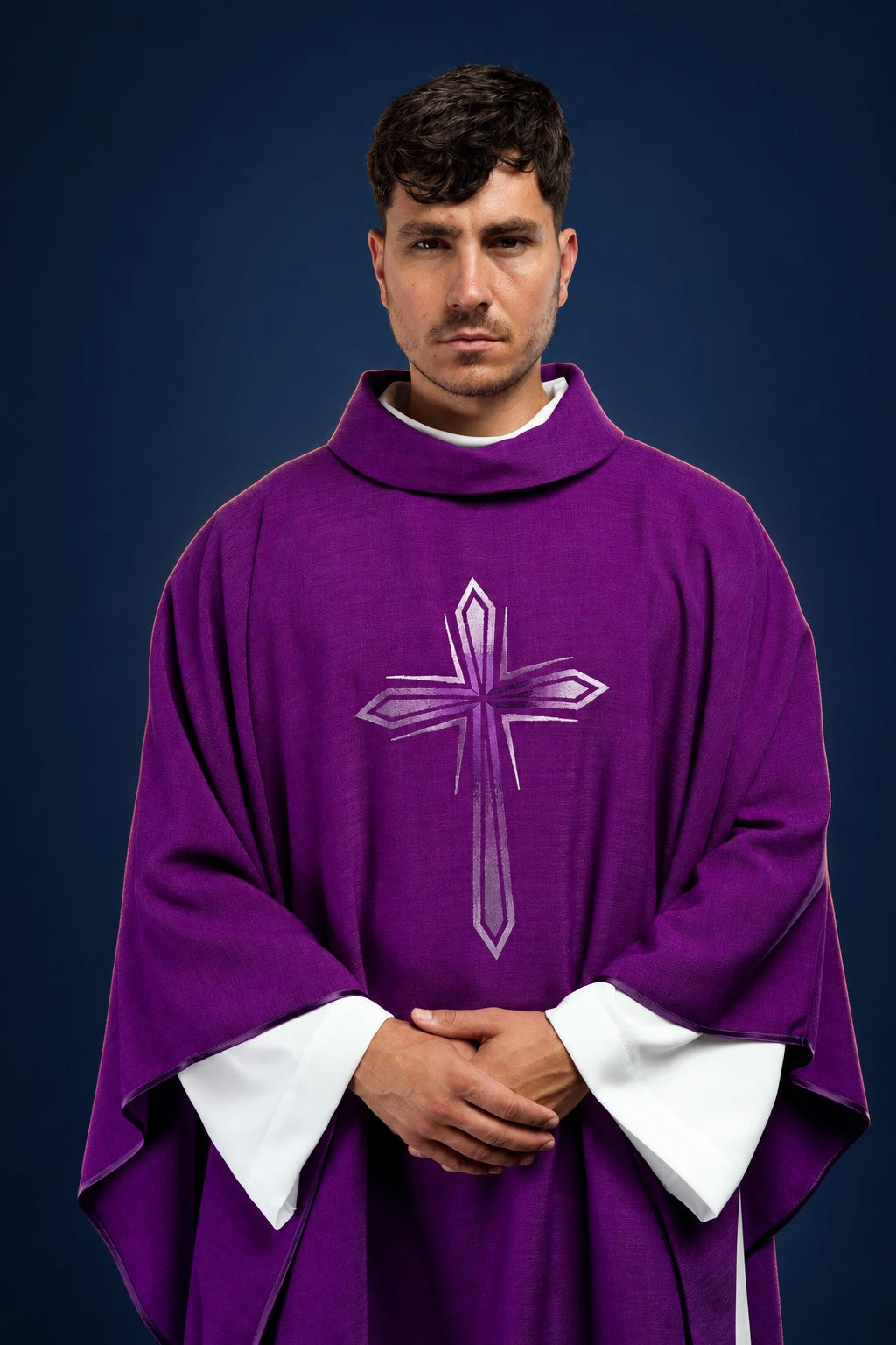 Front view of a purple chasuble with white embroidered cross motif