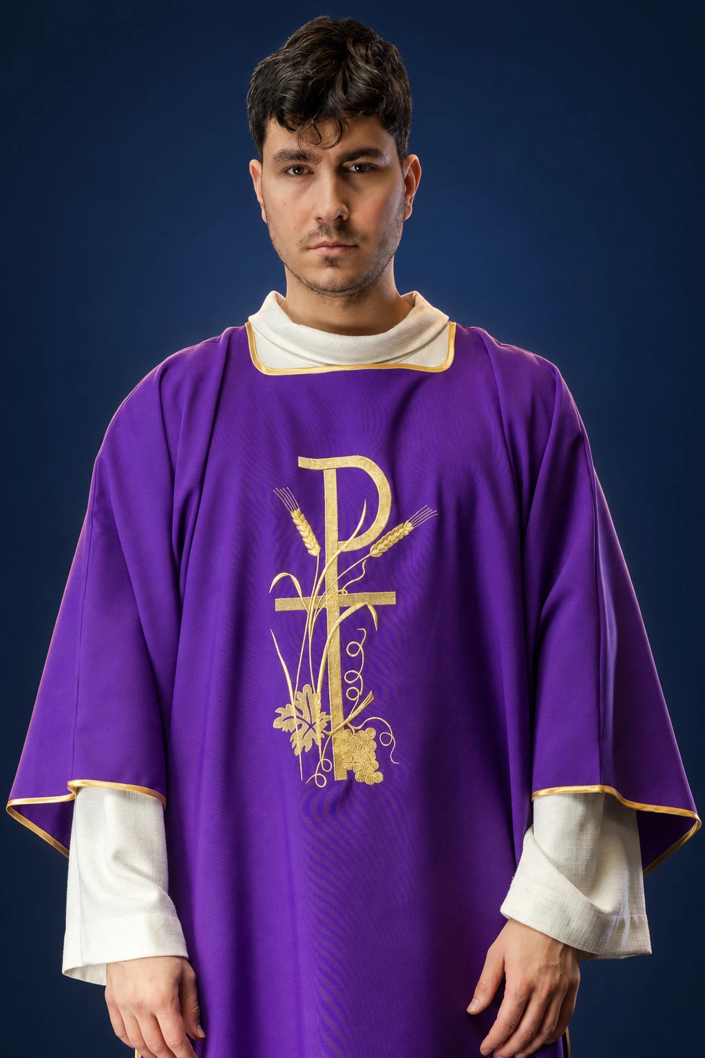 Front view of a purple dalmatic with gold PAX cross embroidery and gold-trimmed edges