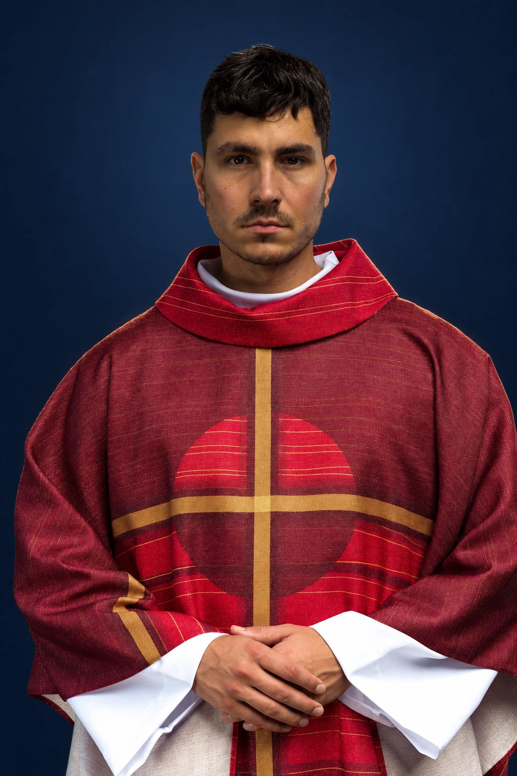 Front view of a red chasuble with a gold cross motif and wide striped collar