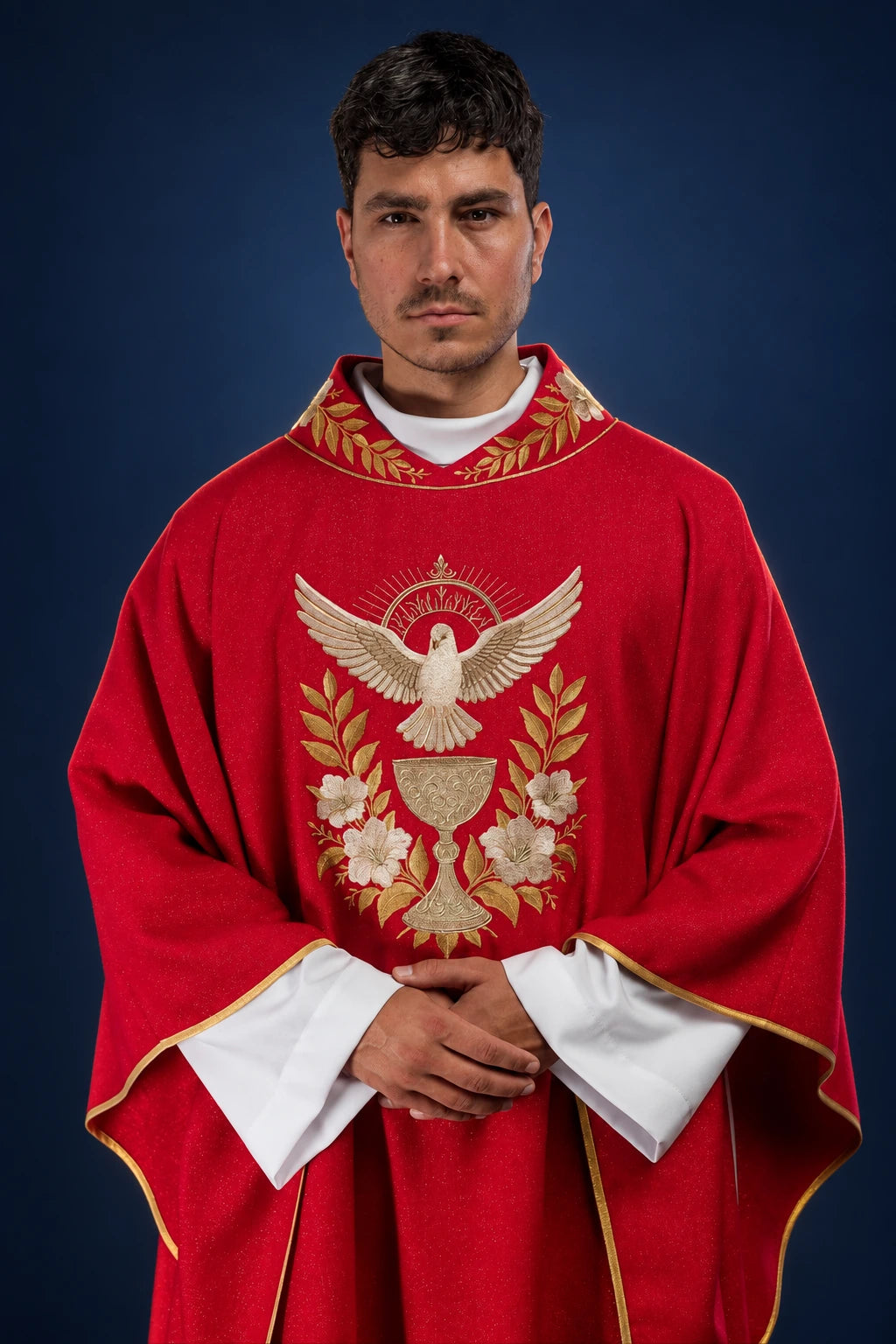 Front view of a red chasuble with gold Holy Spirit dove and floral embroidery