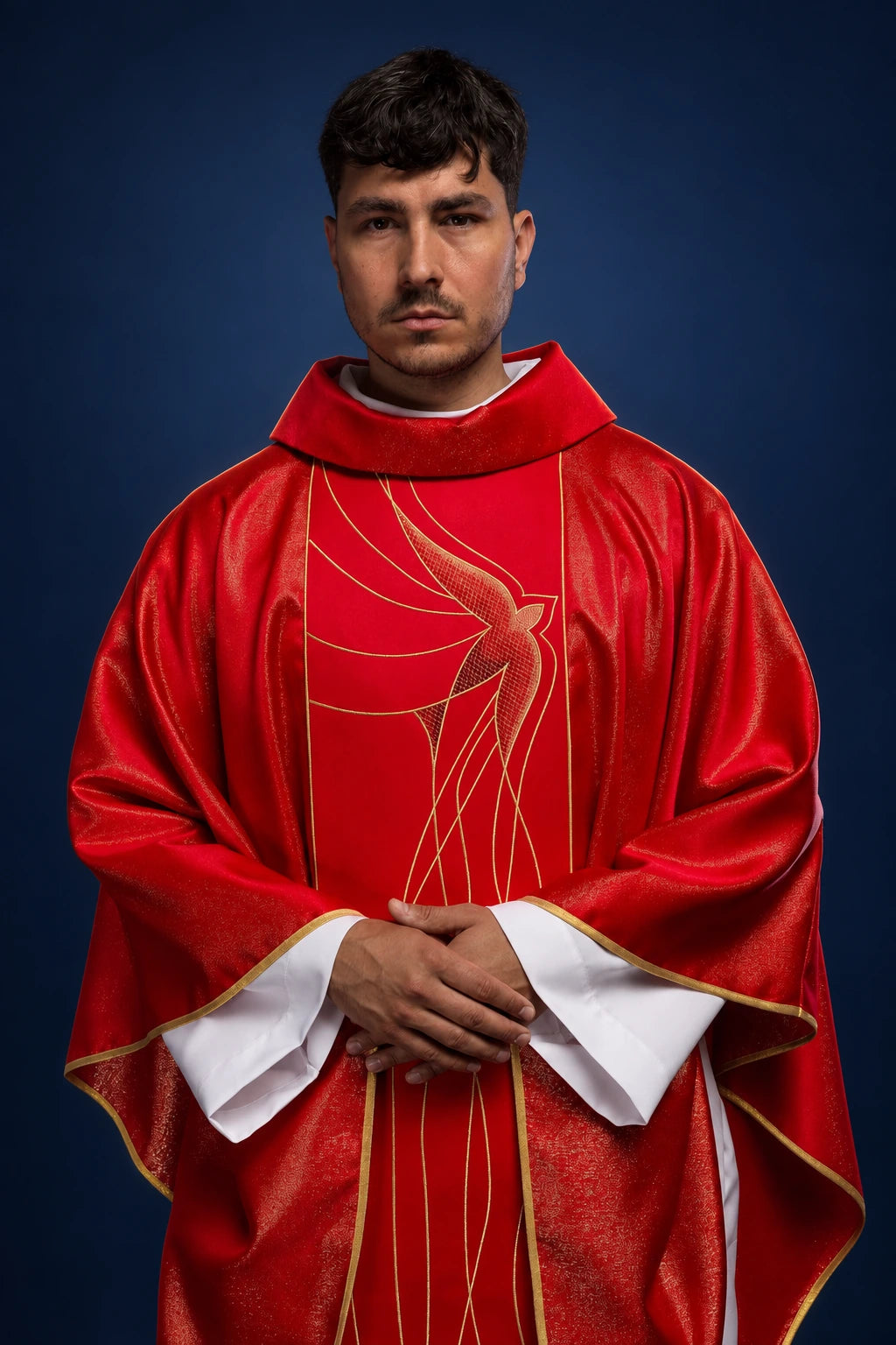 Front view of a red chasuble with gold Holy Spirit embroidery and shimmering fabric