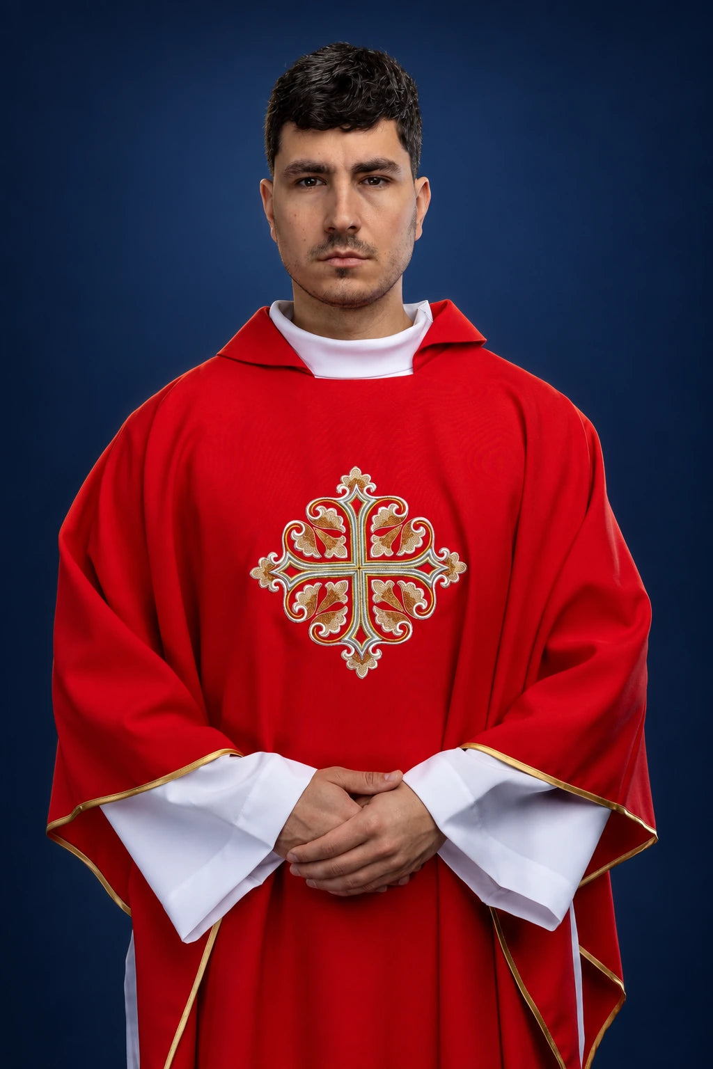 Front view of red chasuble with wide square collar and embroidered cross on the chest