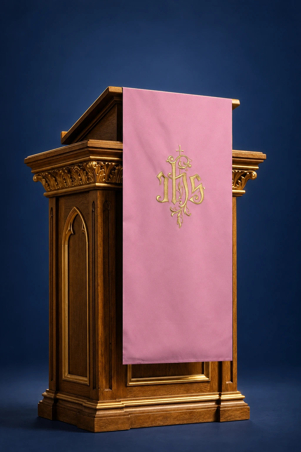 Front view of a rose lectern cover with gold IHS symbol and cross-like flourish