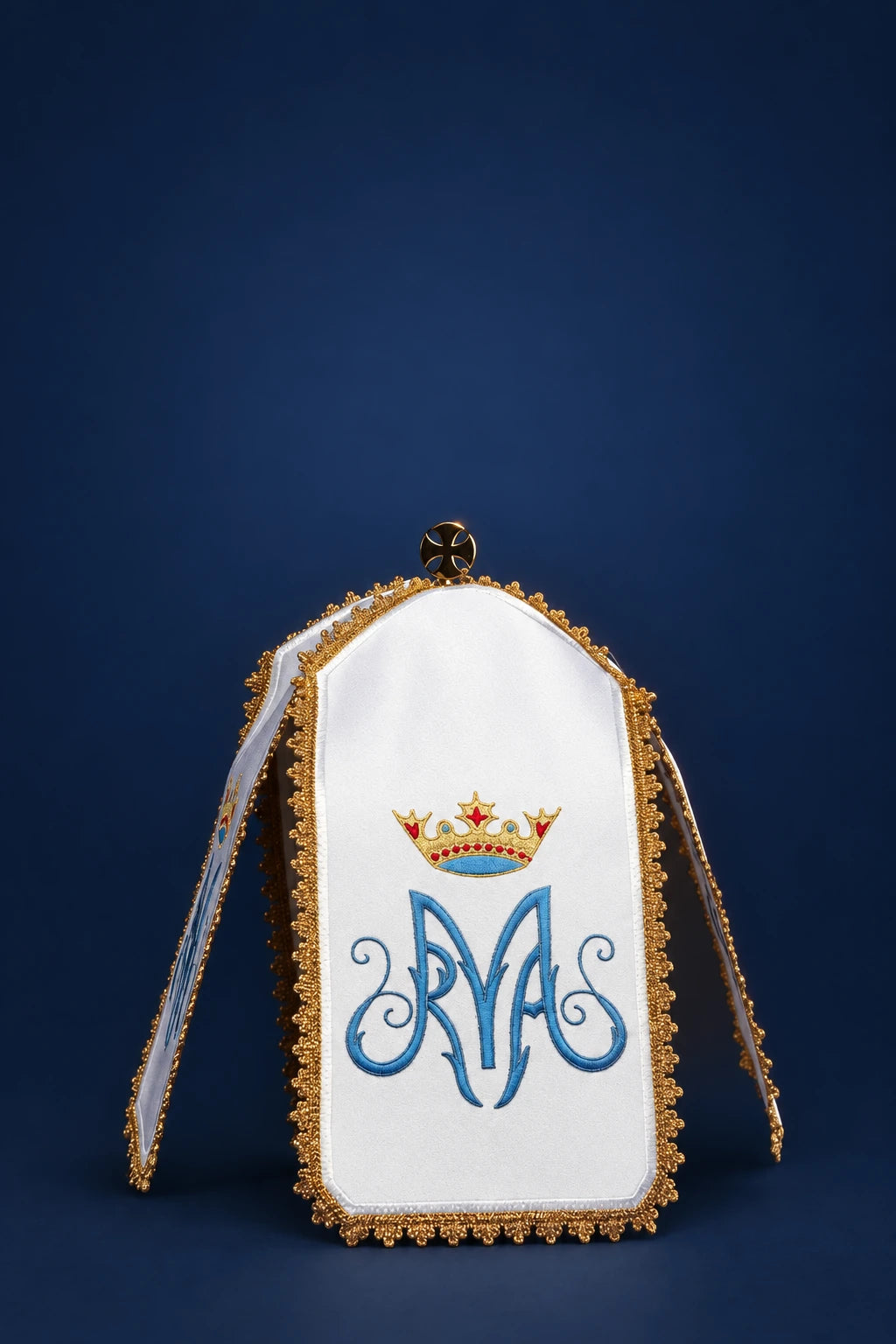 Front view of a white ciborium veil with gold trim and Marian crown monogram embroidery
