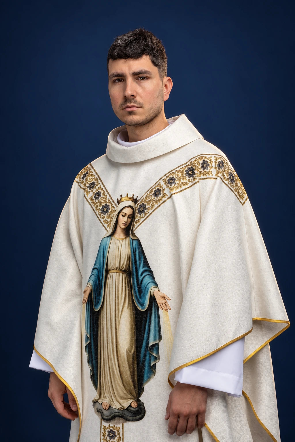 Front view of a white Marian chasuble with gold trim and a large Immaculate Conception print on the front