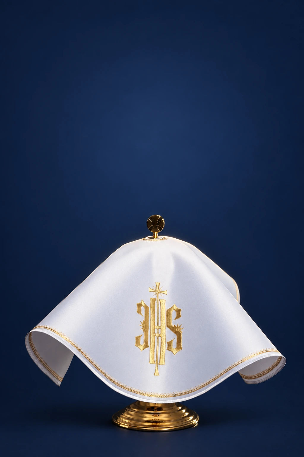 Front view of a white round ciborium veil with gold IHS embroidery and gold trim