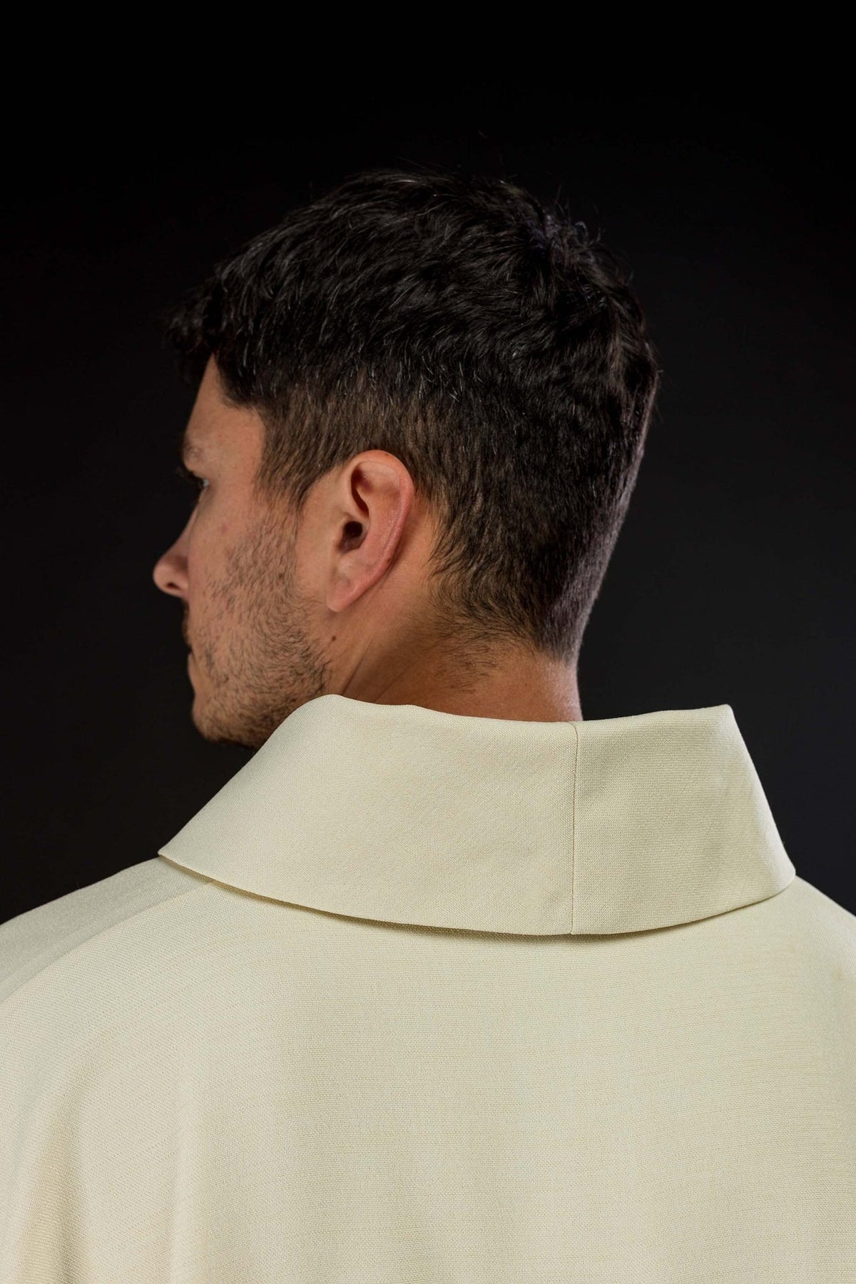 Ivory chasuble close-up of the stand-up collar and plain fabric