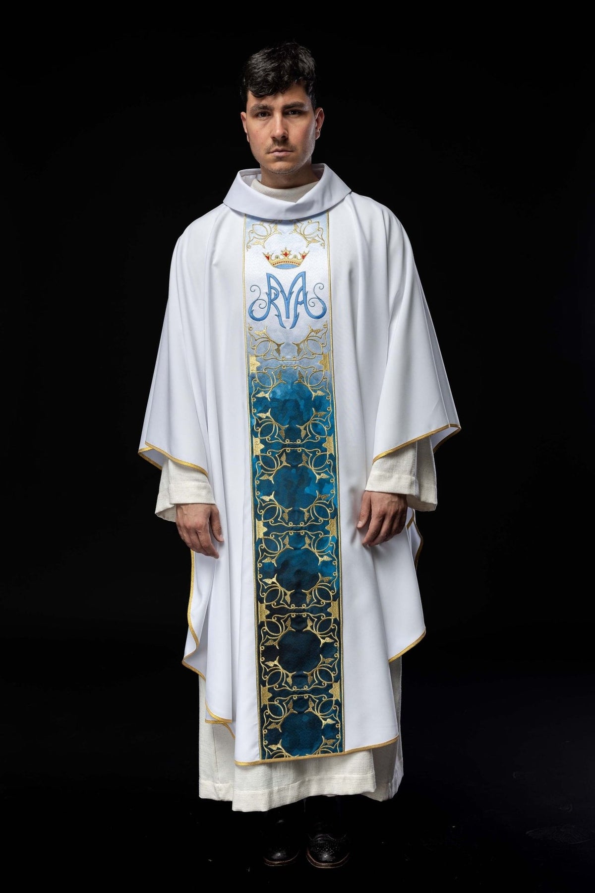 Marian chasuble, full front view with white fabric, gold trim and blue Marian symbol orphrey