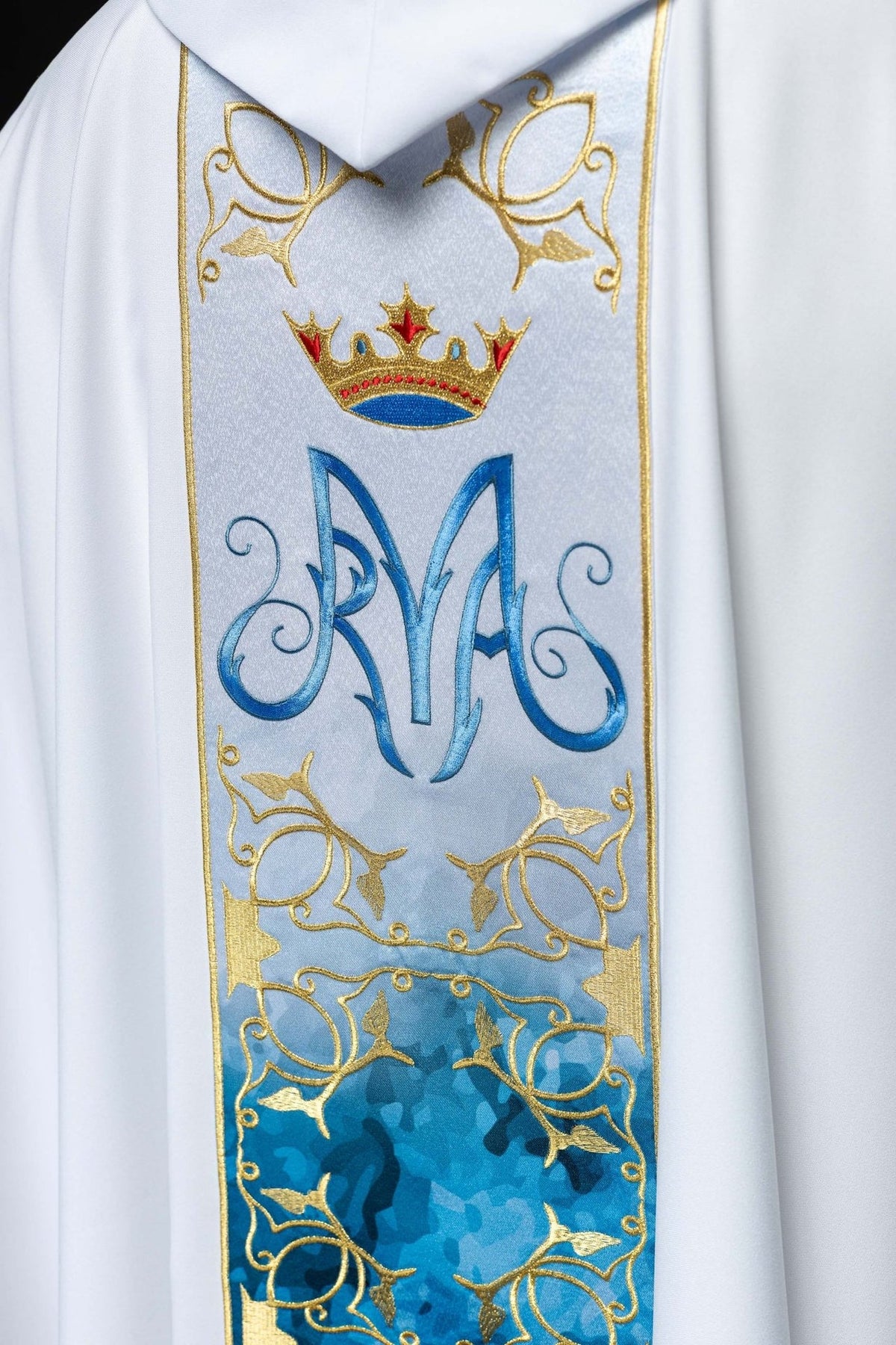 Marian chasuble back detail with embroidered crown and blue Marian symbol on the orphrey