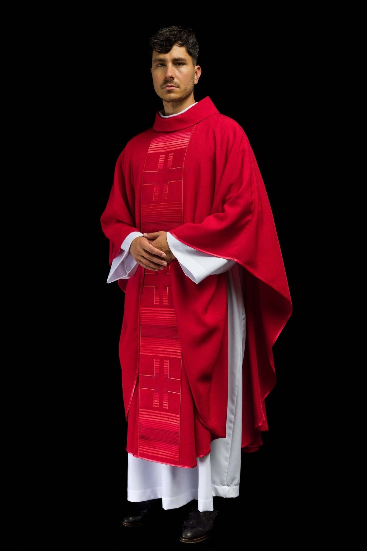 Red chasuble three-quarter front view with embroidered crosses and stand-up collar