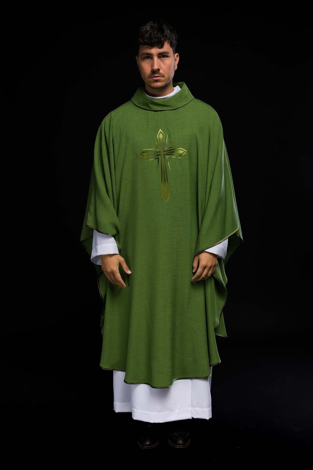 Green chasuble shown full length from the front with embroidered cross and dark trim