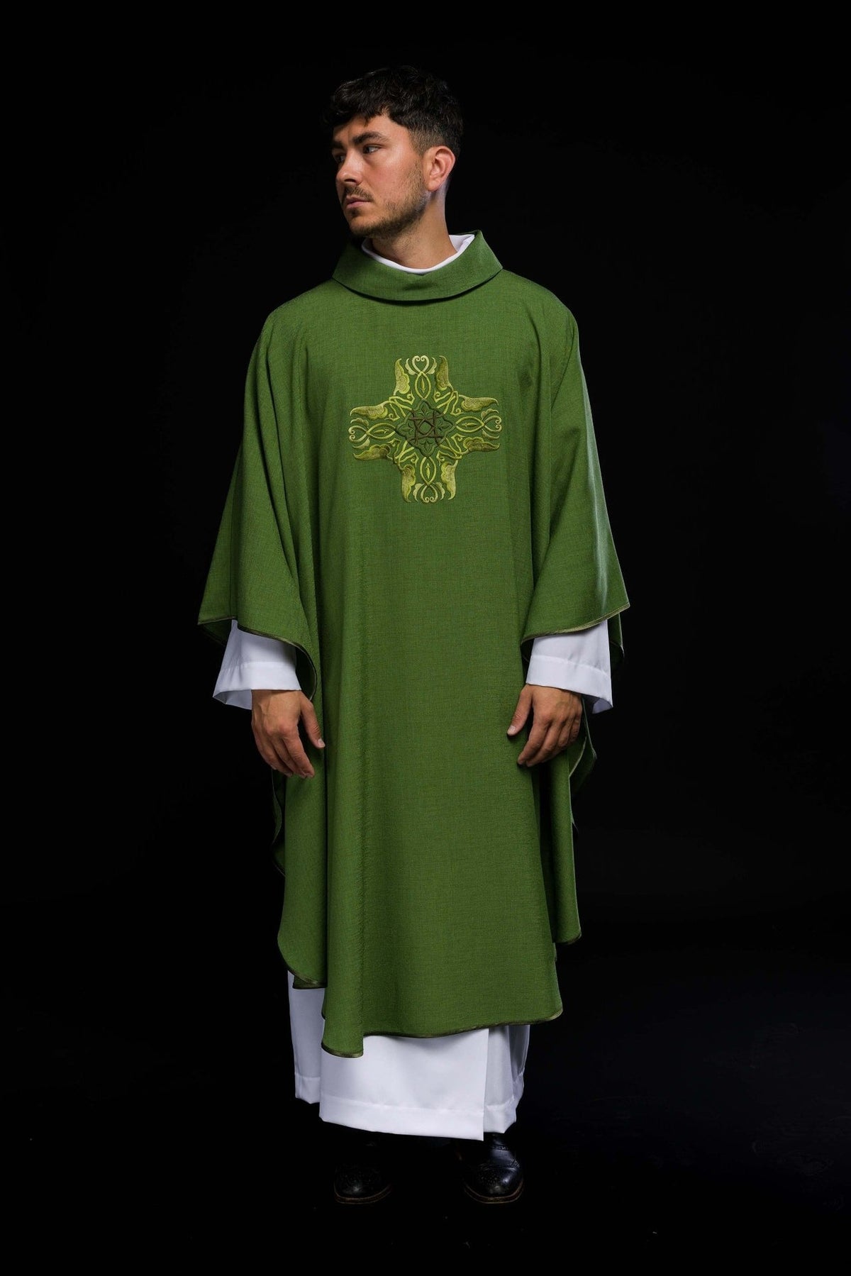 Green chasuble worn, full front view with cross embroidery