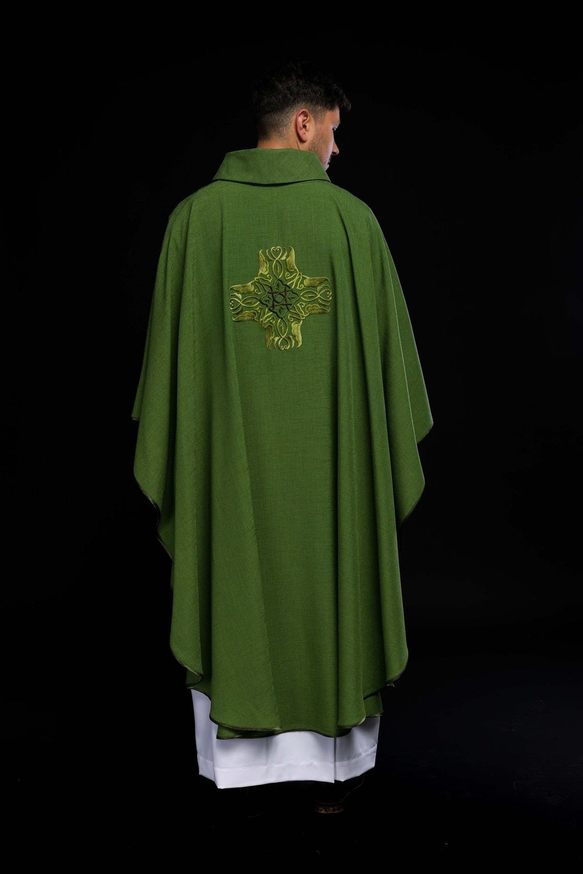 Green chasuble back view with cross embroidery
