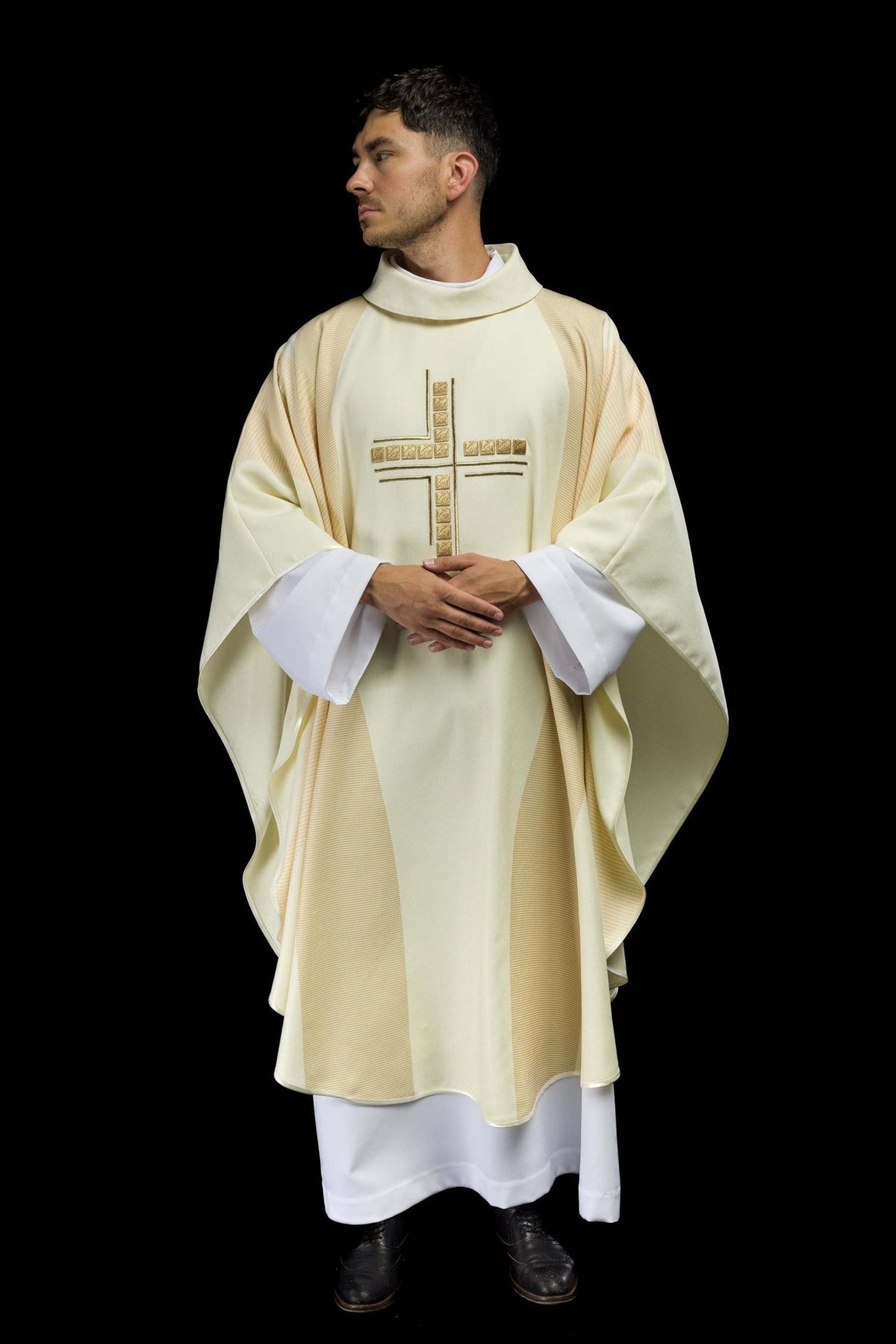 Ecru chasuble front view with embroidered cross and wide sleeves