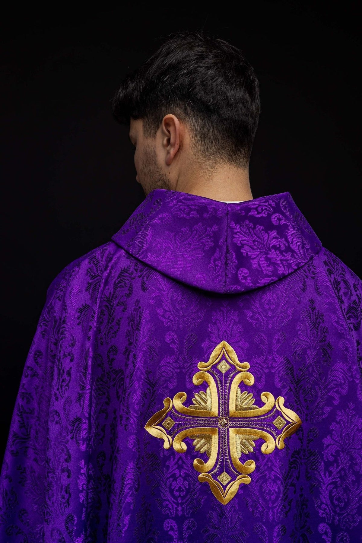 Purple chasuble back close-up with patterned fabric