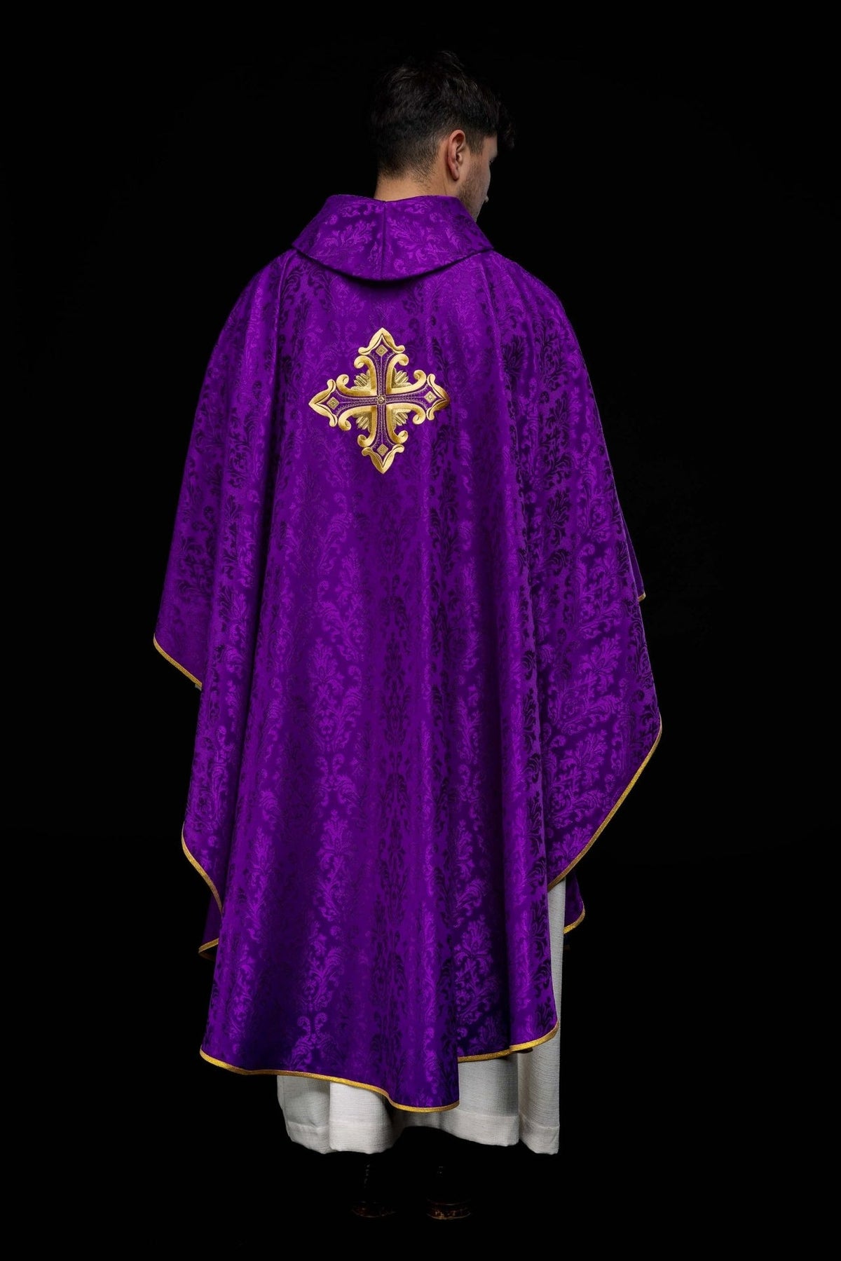 Purple chasuble back with gold cross embroidery and gold trim