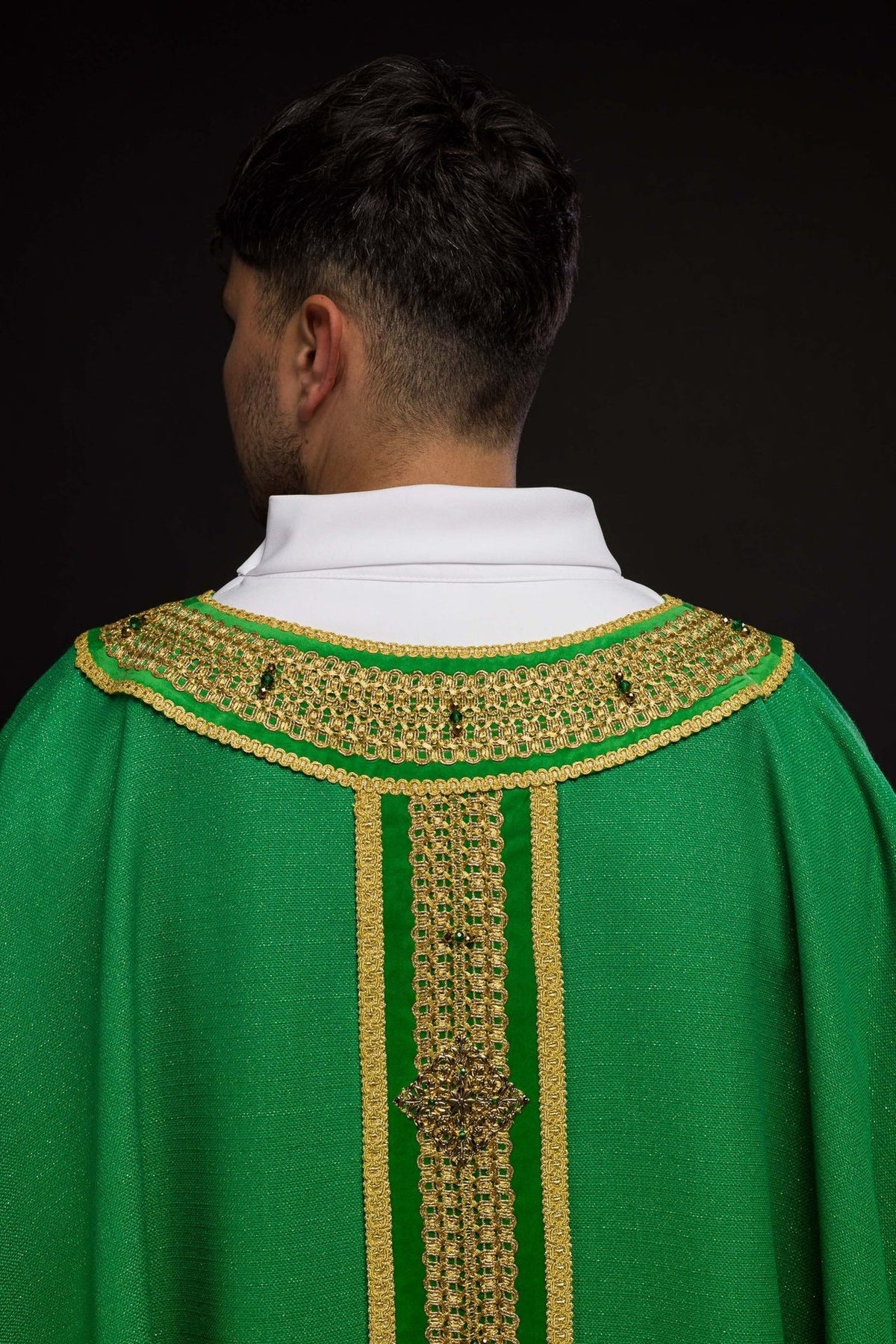 Green chasuble back with gold embroidery, orphrey and natural stones