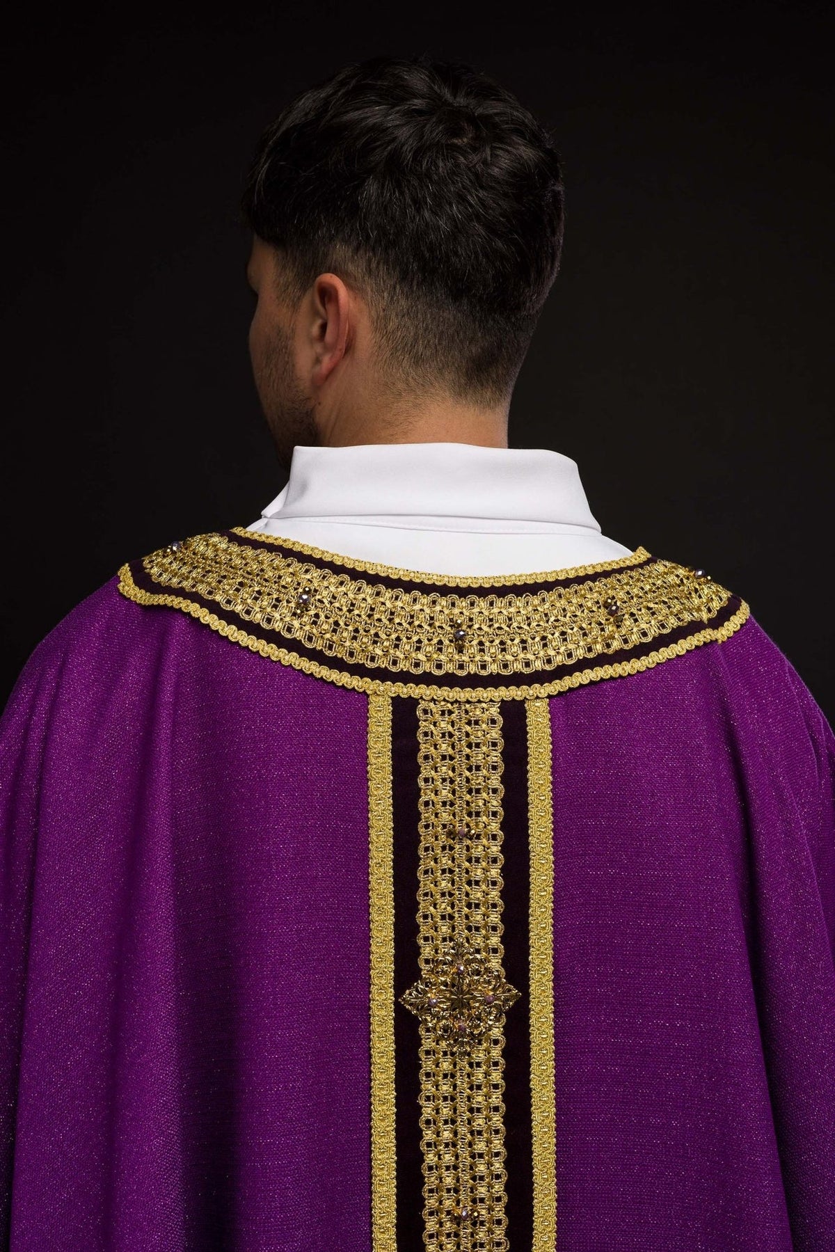 Purple chasuble back view with gold collar embroidery and central orphrey