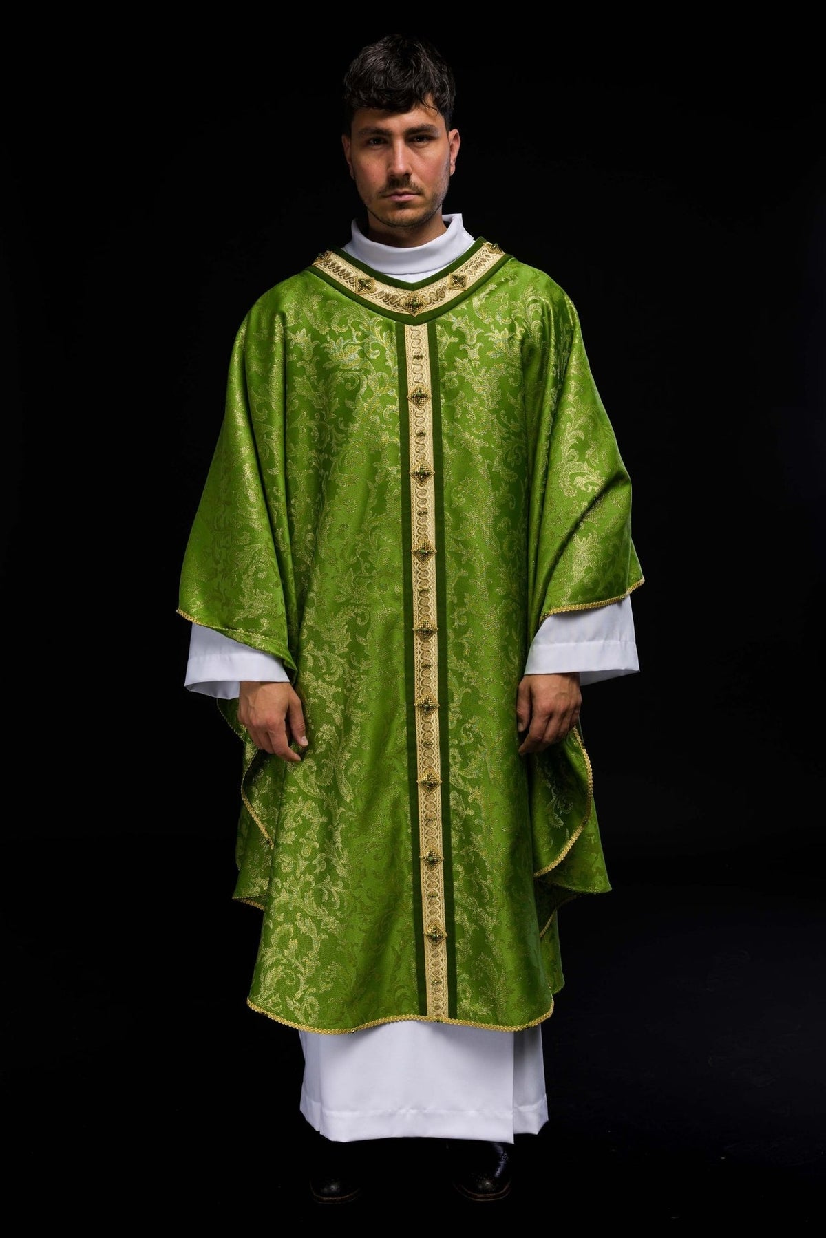 Handcrafted green chasuble worn, front view with gold orphrey and embroidery