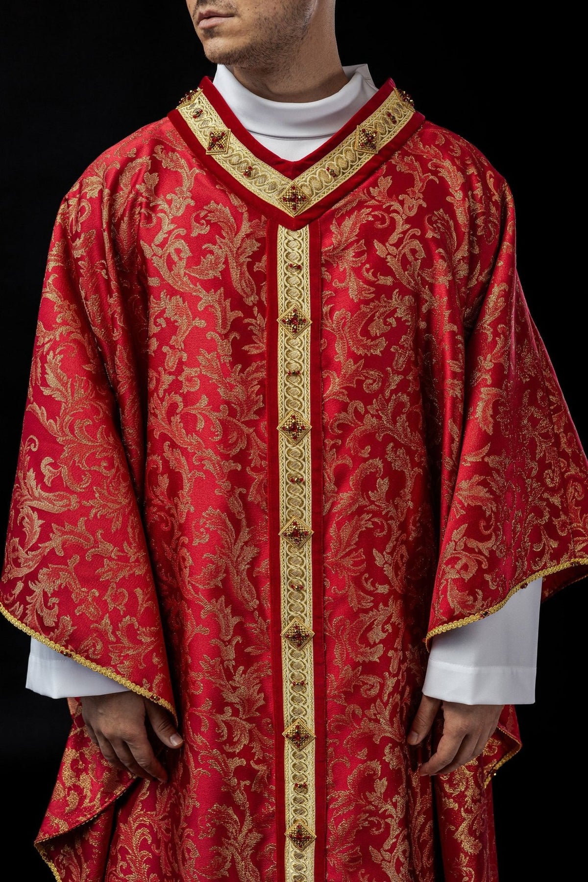 Red chasuble front view with gold floral jacquard, embroidered orphrey and jeweled accents