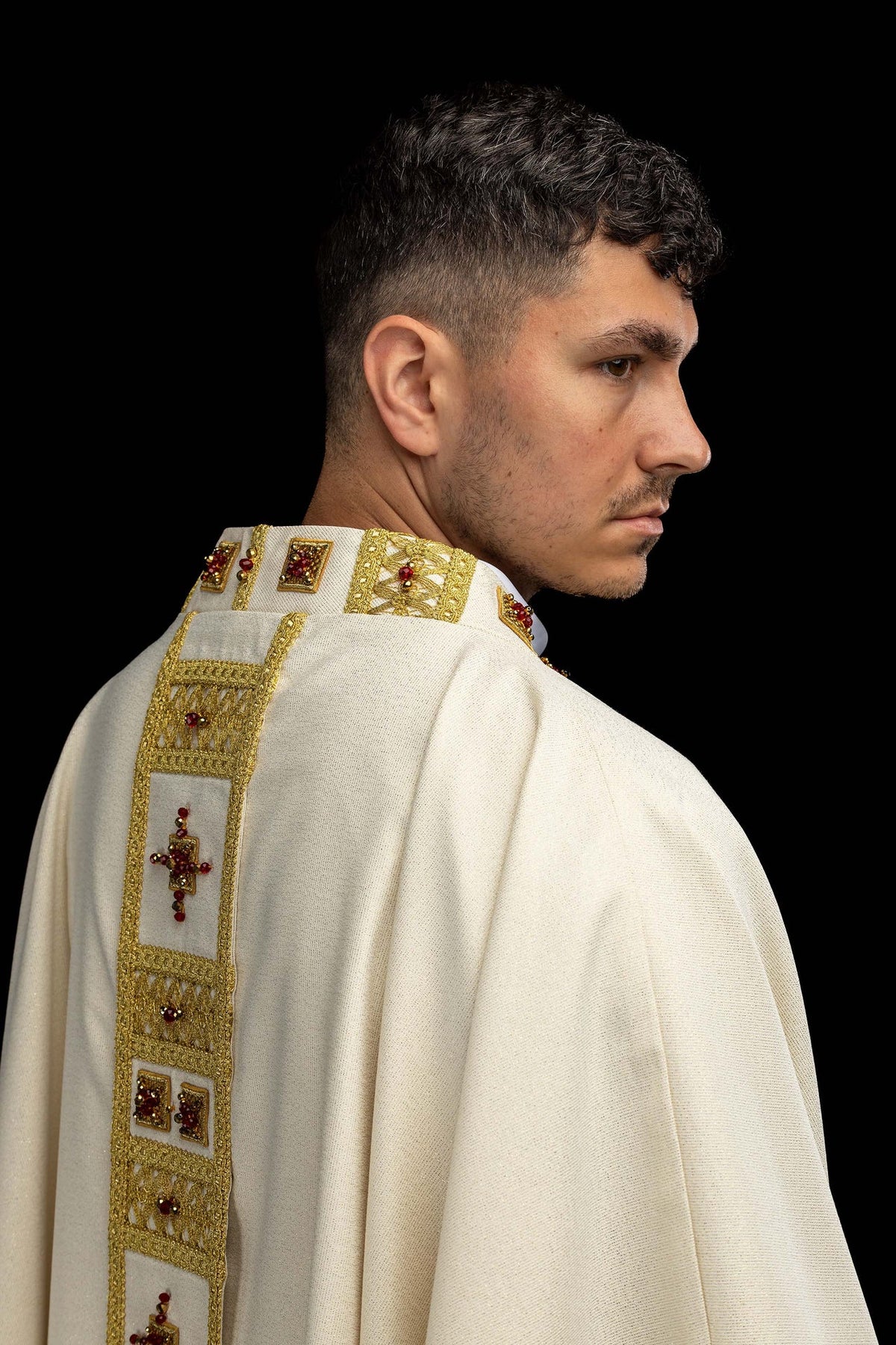 Handcrafted chasuble with natural stones, back detail with gold panel and red stone crosses