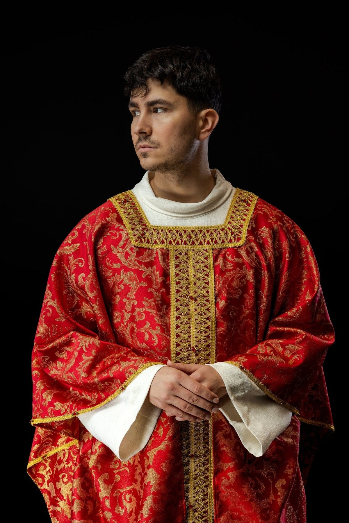 Red and gold chasuble, front upper view with ornate collar and central orphrey
