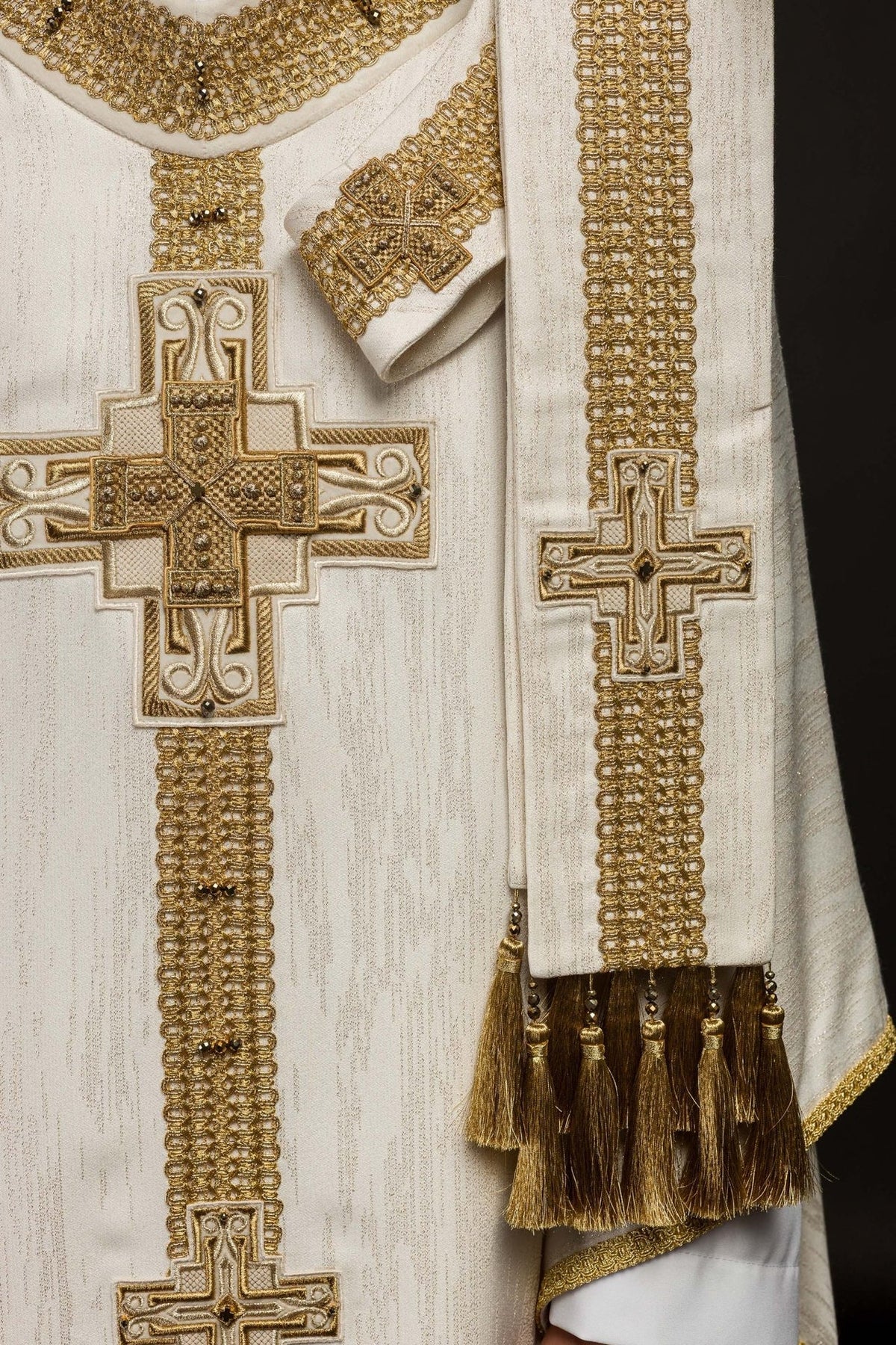 Ecru chasuble with gold stole, crosses and tassel details