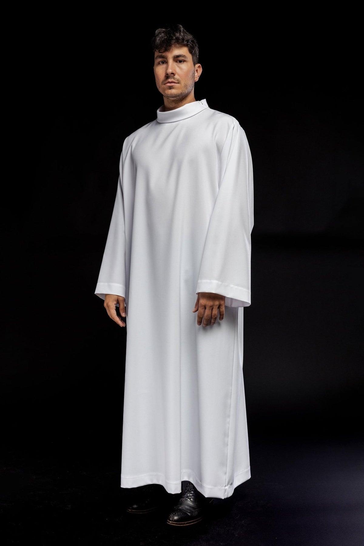 White priest alb, angled front view with wide sleeves and stand collar