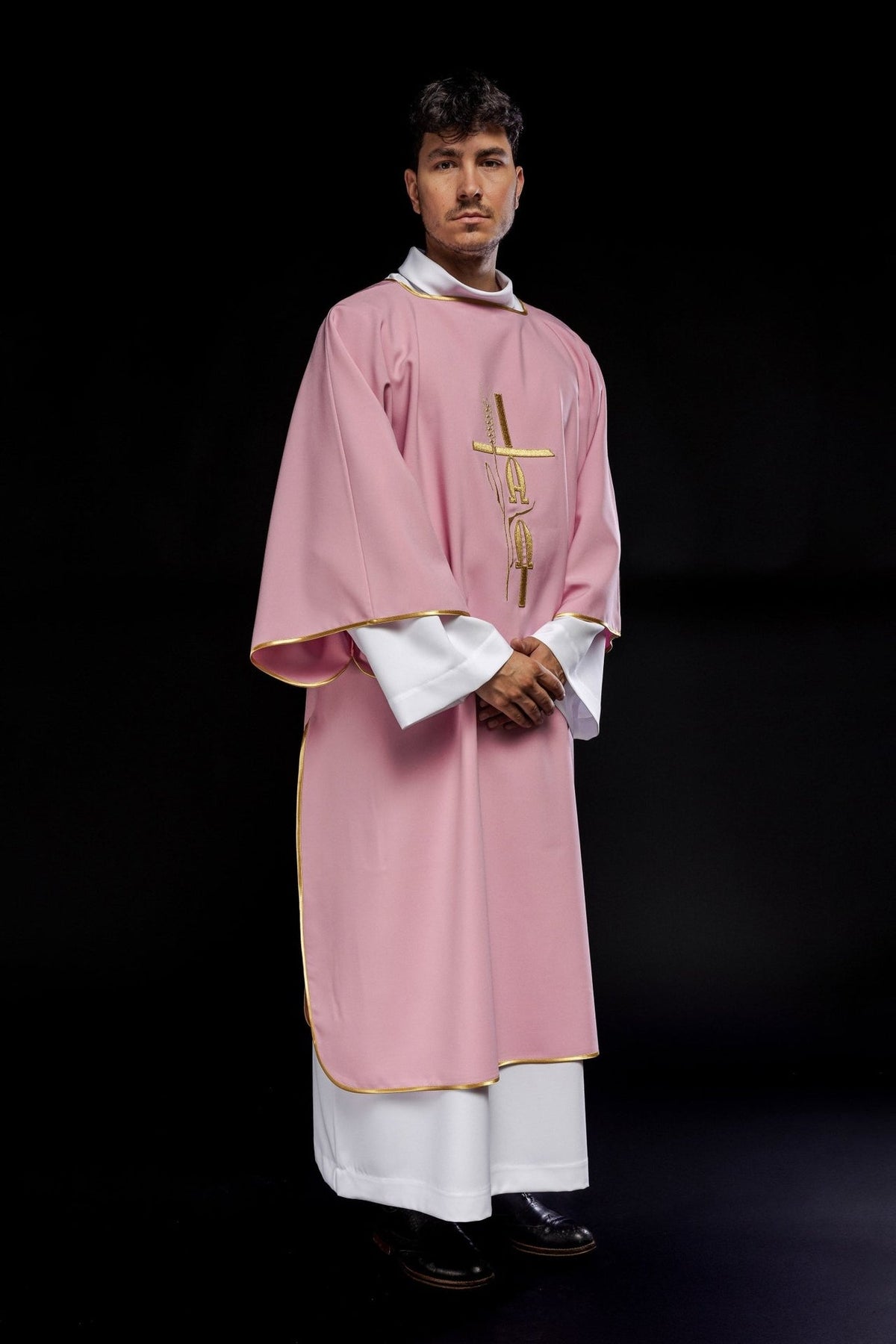 Rose dalmatic three-quarter front view with gold embroidery