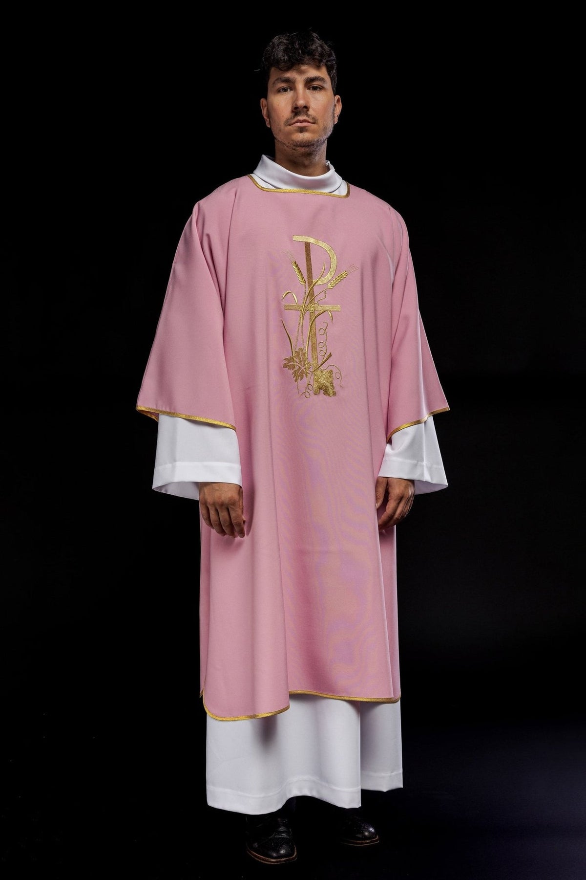 Rose dalmatic front view with gold embroidery and trim
