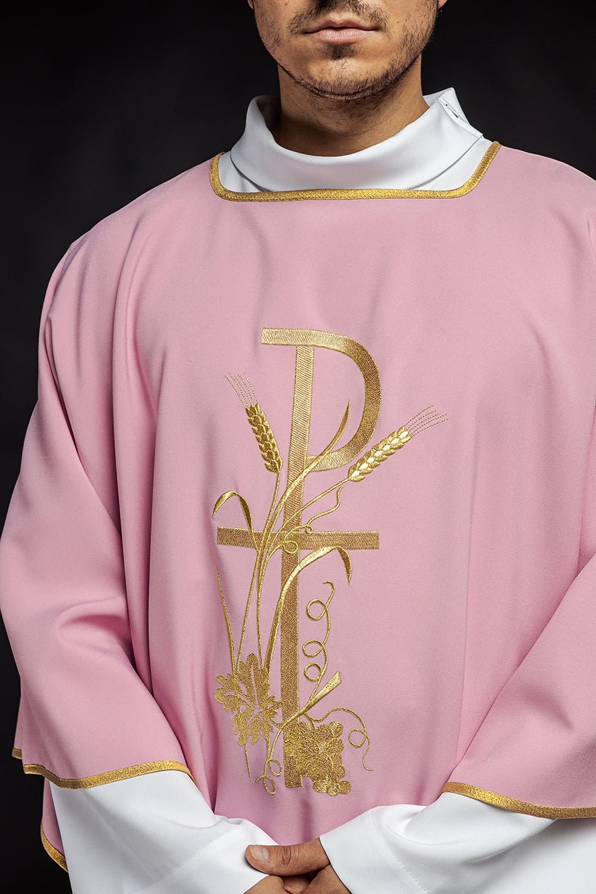 Rose dalmatic close-up of gold PAX cross embroidery
