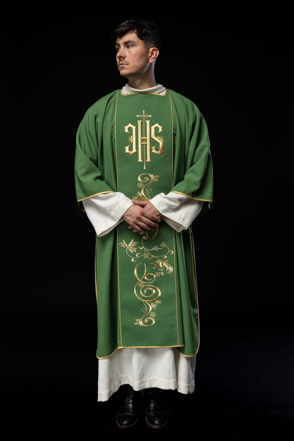 Green dalmatic, full front view with gold IHS and floral embroidery