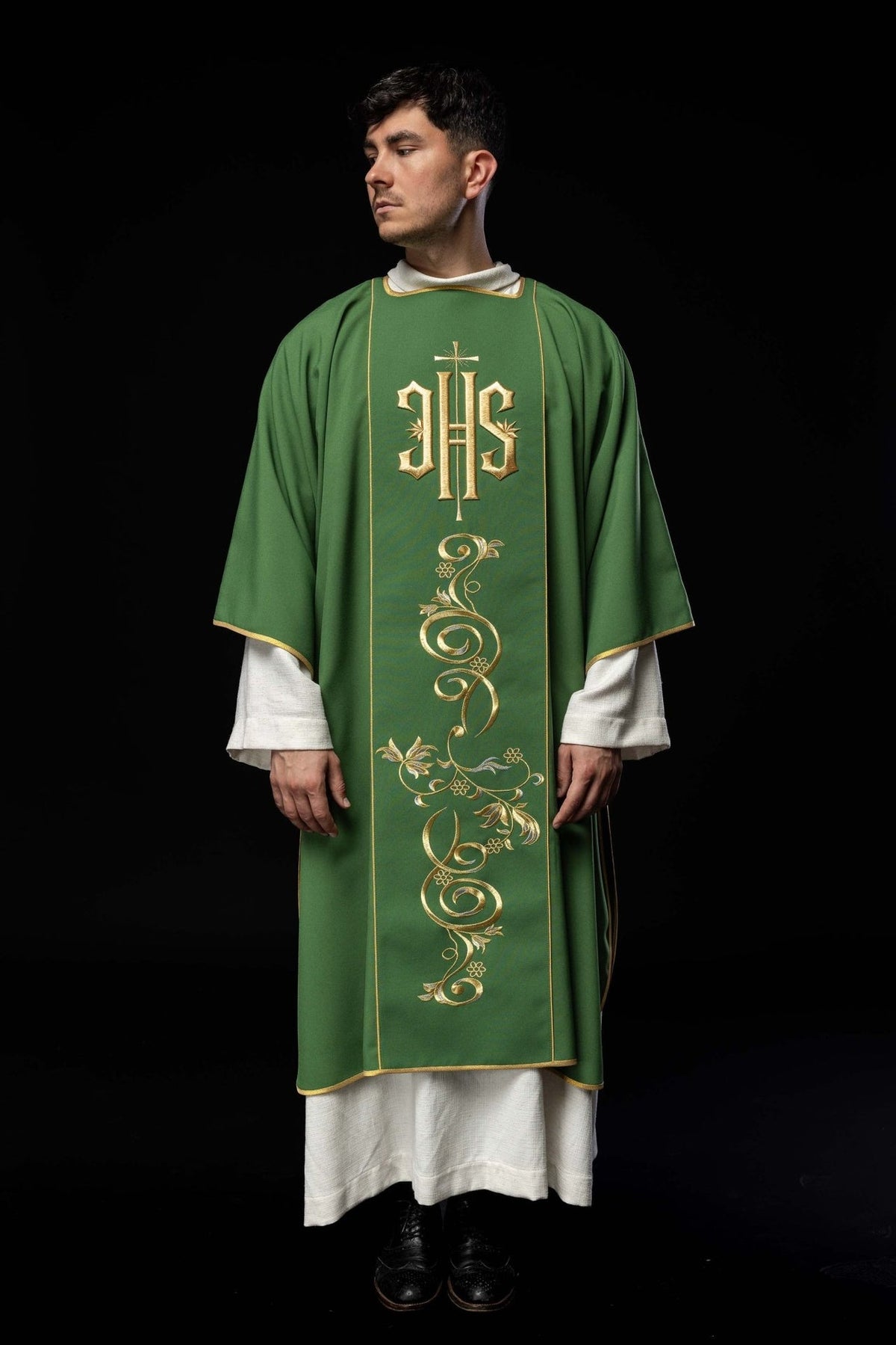Green dalmatic, front view showing gold IHS and full embroidered orphrey