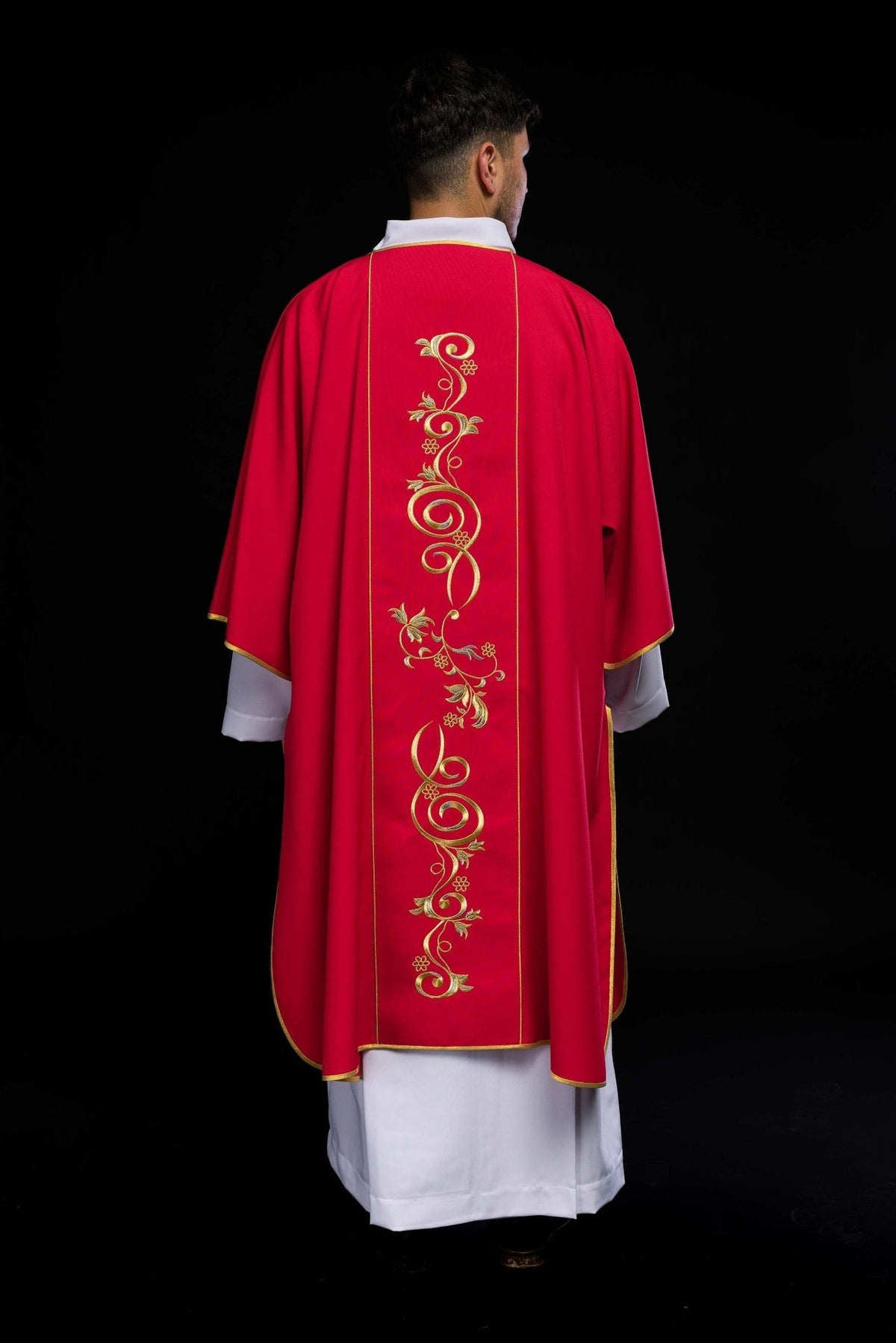 Red dalmatic back view with gold floral embroidery