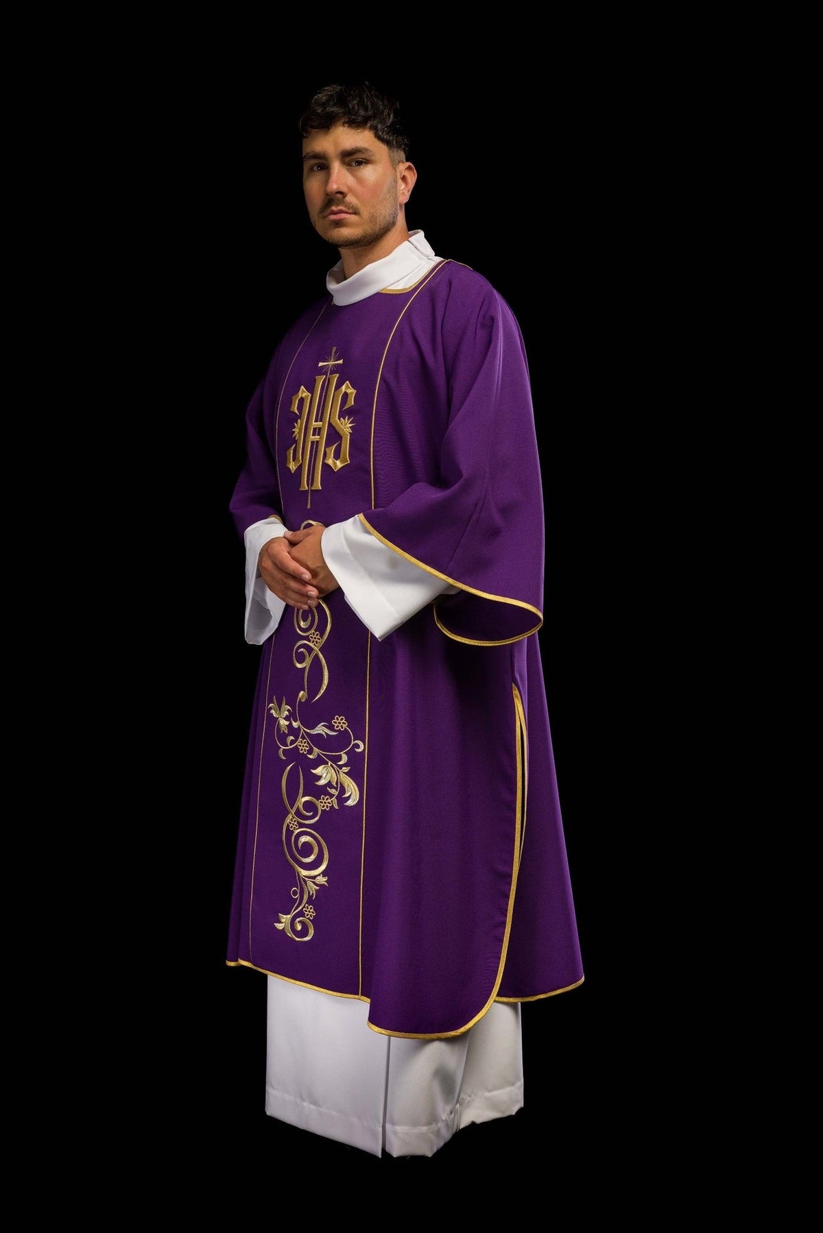 Purple dalmatic side view showing wide sleeves and gold trim